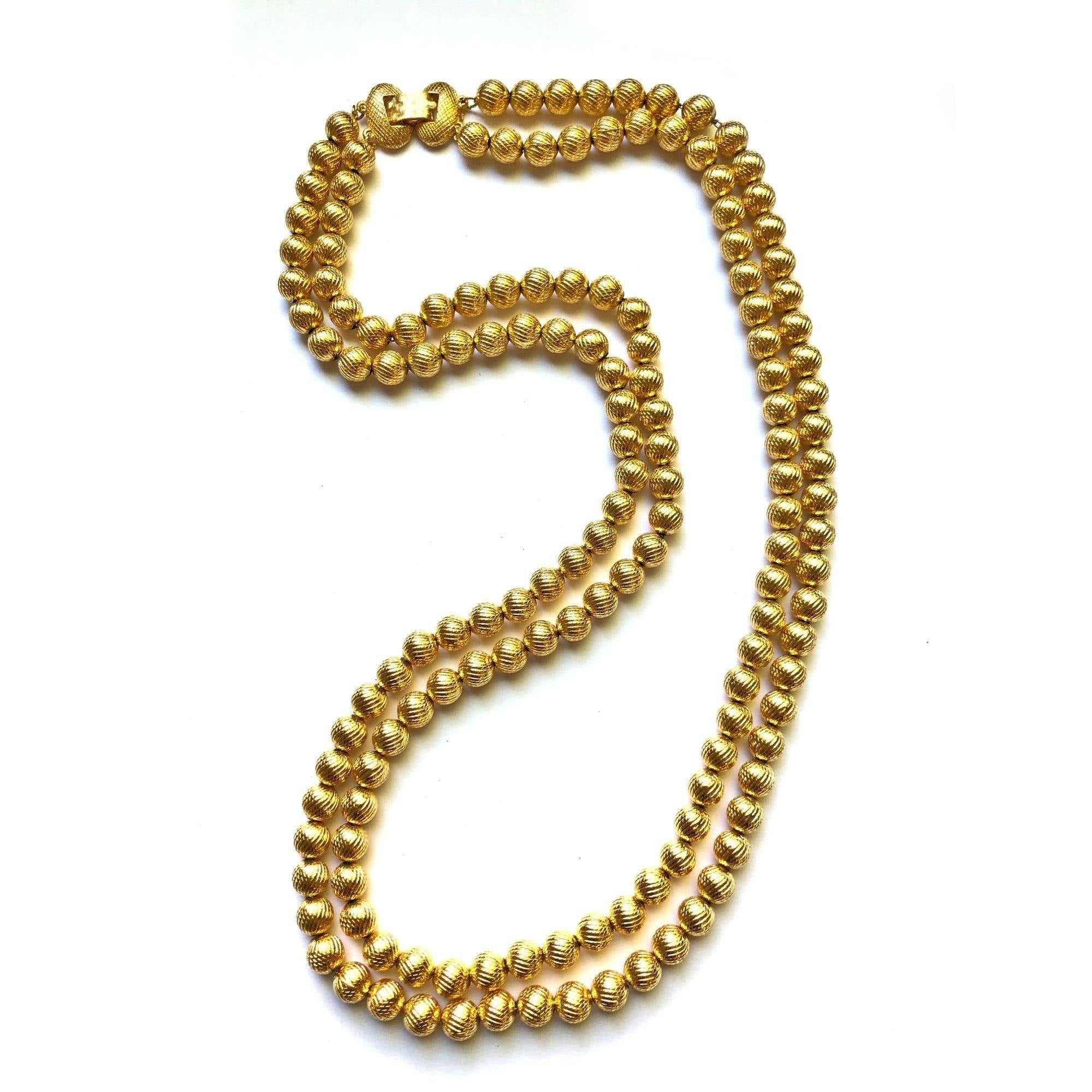 Vintage Double-Strand Gold Bead Necklace by Unsigned Beauty - Vintage Meet Modern Vintage Jewelry - Chicago, Illinois - #oldhollywoodglamour #vintagemeetmodern #designervintage #jewelrybox #antiquejewelry #vintagejewelry