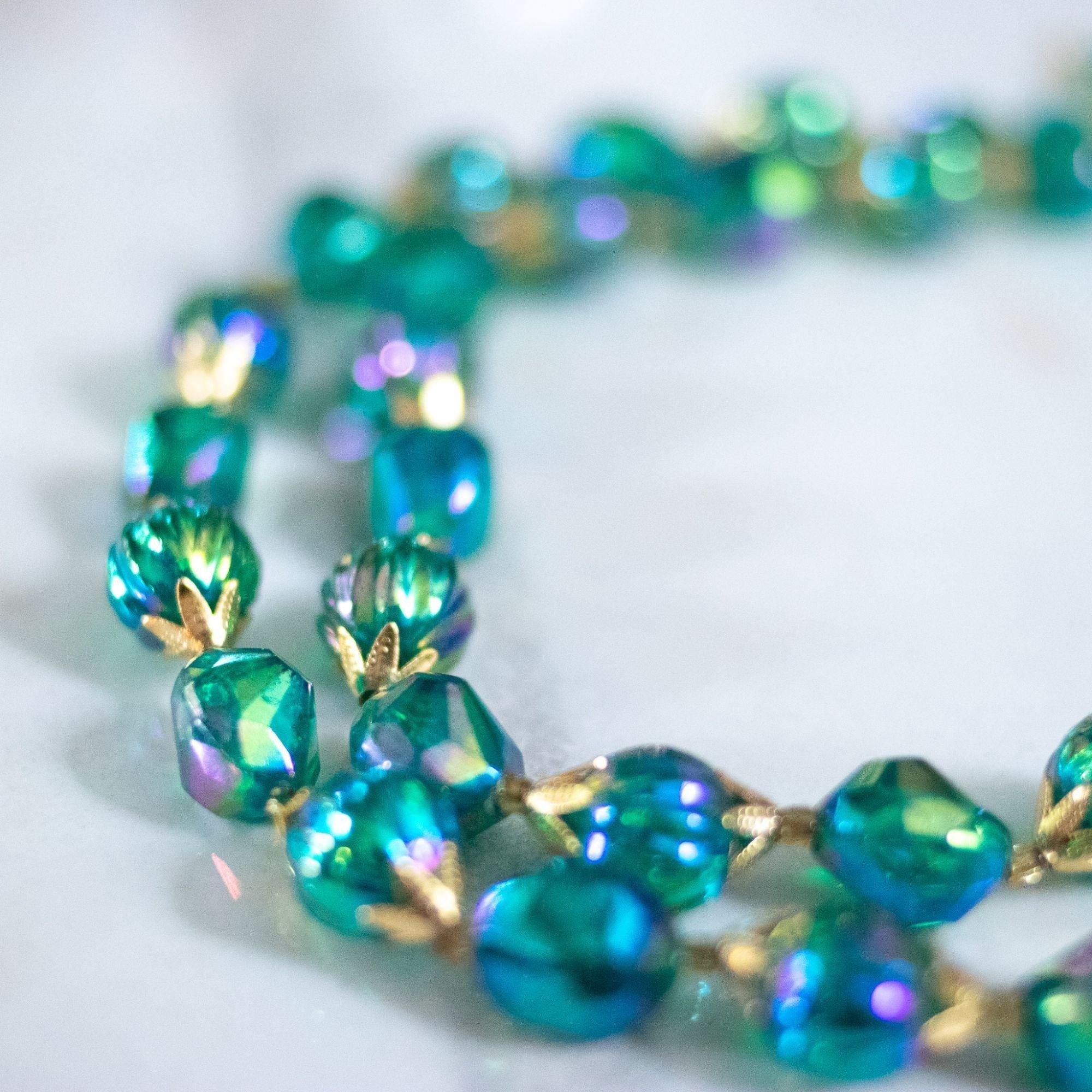 Vintage Iridescent Green Beaded Double Strand Necklace by Hong Kong - Vintage Meet Modern Vintage Jewelry - Chicago, Illinois - #oldhollywoodglamour #vintagemeetmodern #designervintage #jewelrybox #antiquejewelry #vintagejewelry