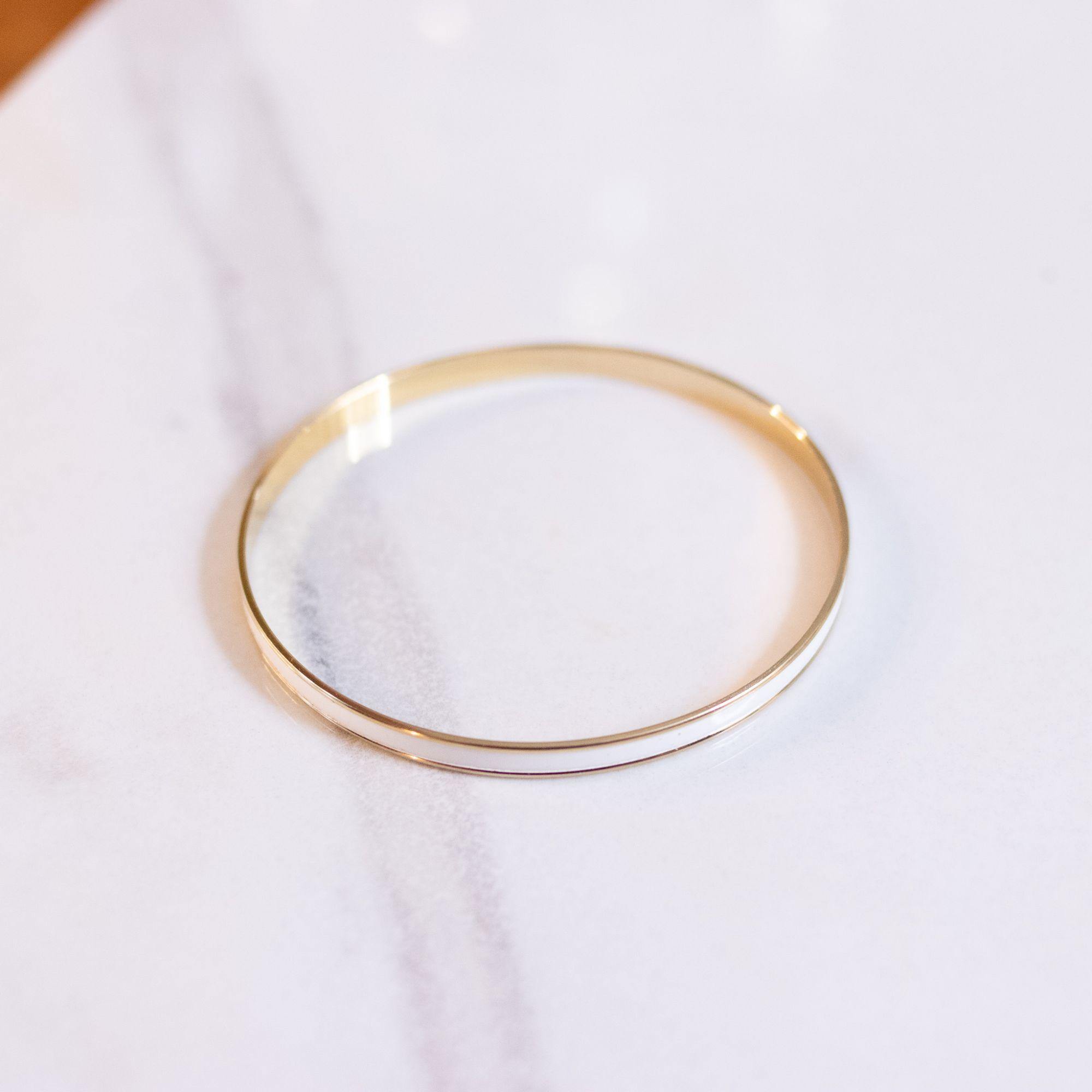 Vintage Napier Cream Enamel Gold Thin Bangle Bracelet by Napier - Vintage Meet Modern Vintage Jewelry - Chicago, Illinois - #oldhollywoodglamour #vintagemeetmodern #designervintage #jewelrybox #antiquejewelry #vintagejewelry