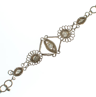 Vintage Silver Filigree Wire Work Bracelet with Rhinestones by Vintage Meet Modern  - Vintage Meet Modern Vintage Jewelry - Chicago, Illinois - #oldhollywoodglamour #vintagemeetmodern #designervintage #jewelrybox #antiquejewelry #vintagejewelry