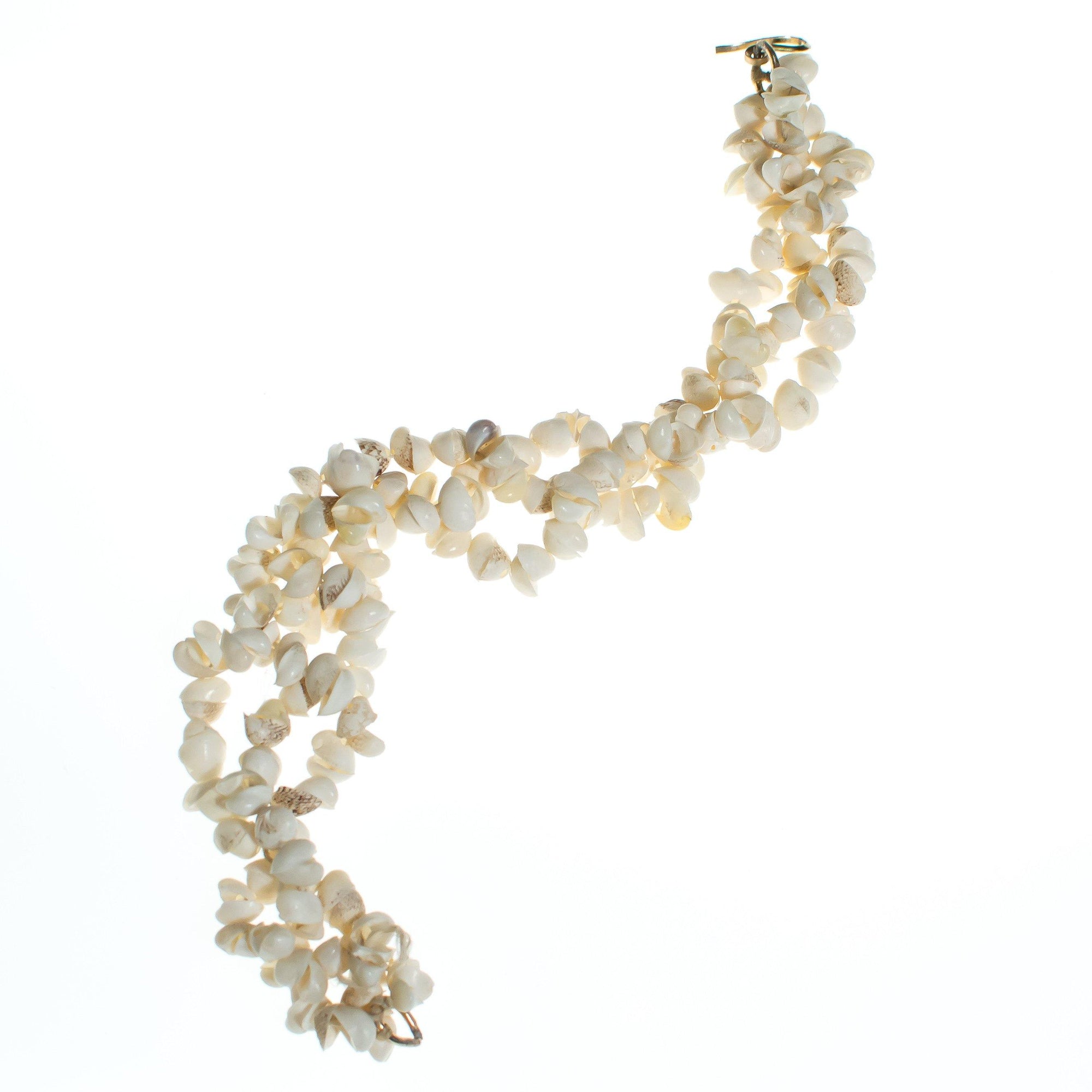 Vintage White Shell Bracelet by Vintage Meet Modern - Vintage Meet Modern Vintage Jewelry - Chicago, Illinois - #oldhollywoodglamour #vintagemeetmodern #designervintage #jewelrybox #antiquejewelry #vintagejewelry