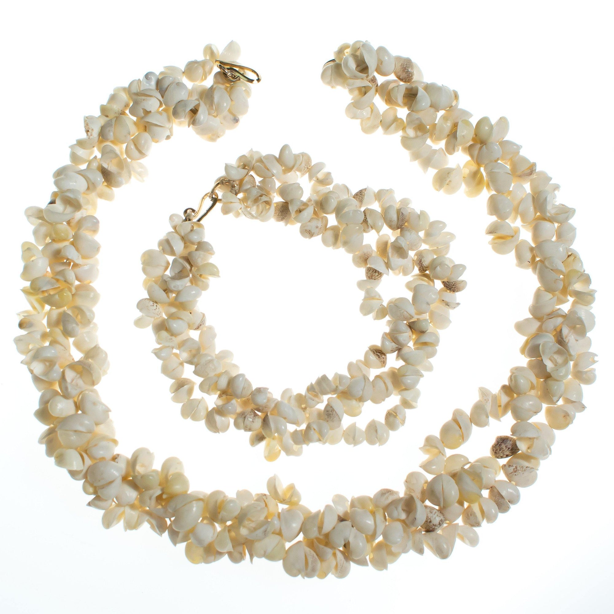 White Triple Strand Shell Necklace by Vintage Meet Modern - Vintage Meet Modern Vintage Jewelry - Chicago, Illinois - #oldhollywoodglamour #vintagemeetmodern #designervintage #jewelrybox #antiquejewelry #vintagejewelry