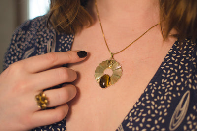 Tigers Eye Egyptian Revival Medallion Necklace by Vintage Meet Modern - Vintage Meet Modern Vintage Jewelry - Chicago, Illinois - #oldhollywoodglamour #vintagemeetmodern #designervintage #jewelrybox #antiquejewelry #vintagejewelry