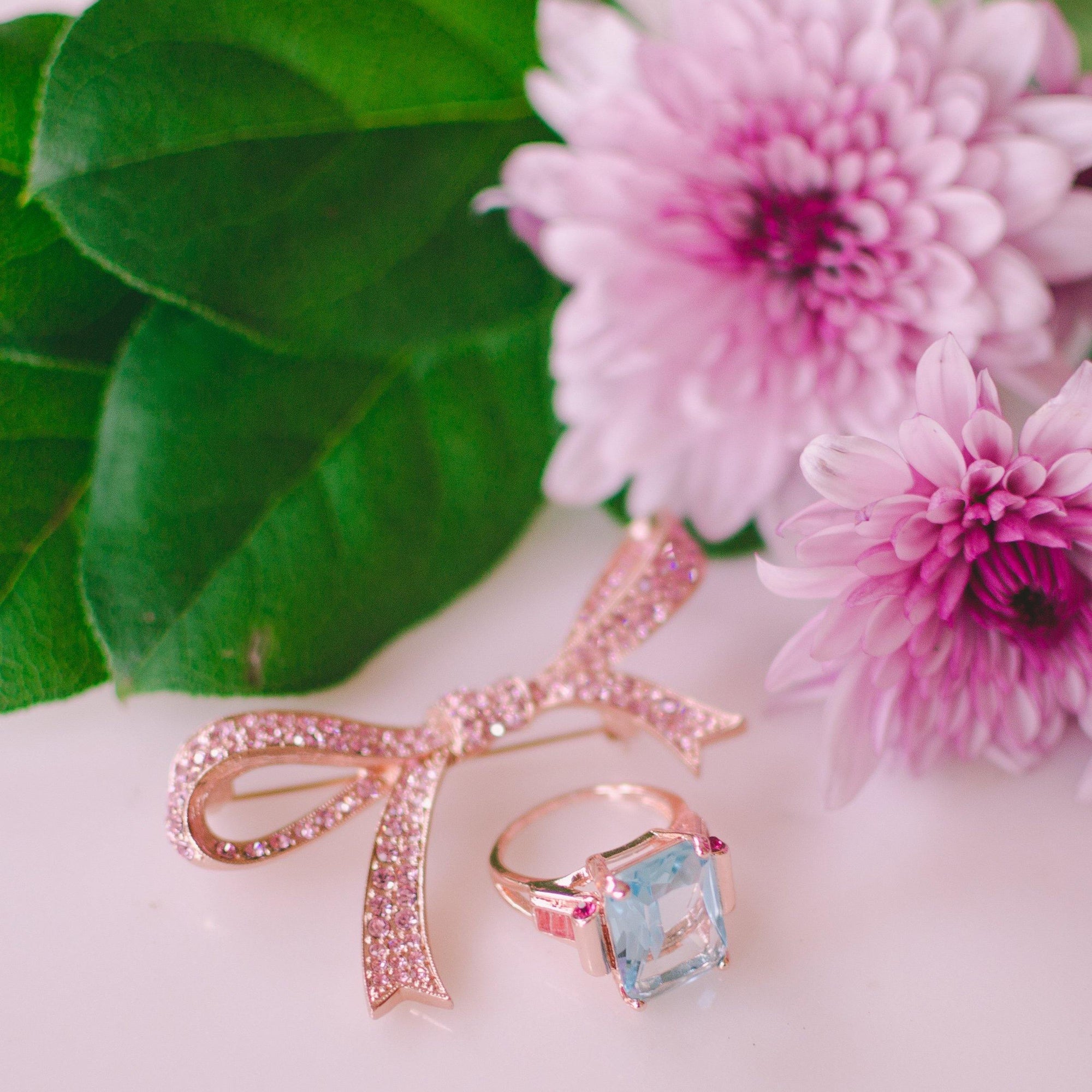 Vintage Pink Rhinestone Bow Brooch by Kenneth Jay Lane by Vintage Meet Modern - Vintage Meet Modern Vintage Jewelry - Chicago, Illinois - #oldhollywoodglamour #vintagemeetmodern #designervintage #jewelrybox #antiquejewelry #vintagejewelry