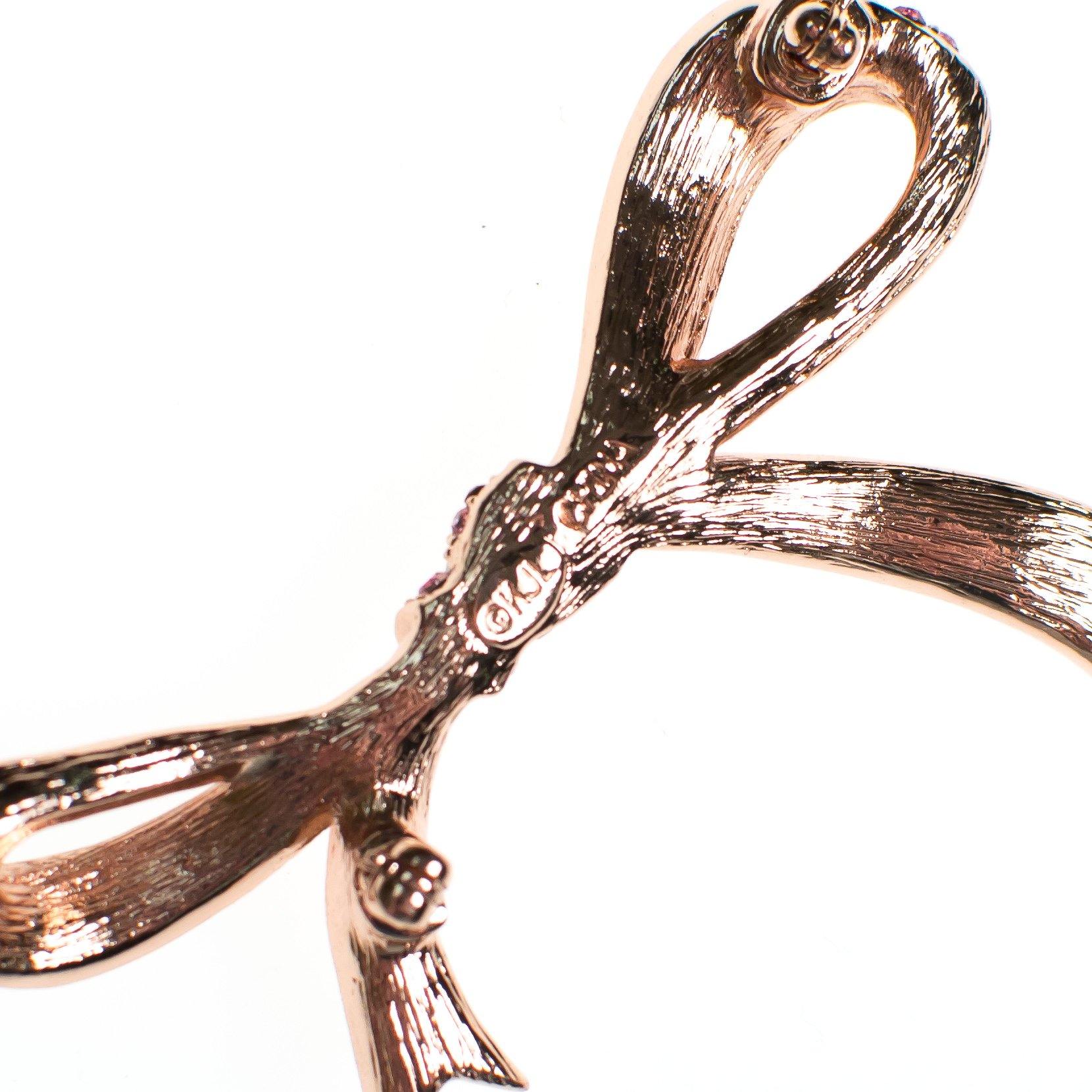 Vintage Pink Rhinestone Bow Brooch by Kenneth Jay Lane by Vintage Meet Modern - Vintage Meet Modern Vintage Jewelry - Chicago, Illinois - #oldhollywoodglamour #vintagemeetmodern #designervintage #jewelrybox #antiquejewelry #vintagejewelry