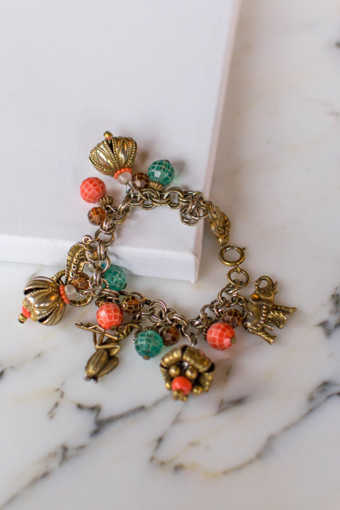 Loaded Charm Bracelet, Snake Charmer, Cobra, Elephant, Moroccan Influence, 1940s Made in Germany by Made in Germany - Vintage Meet Modern Vintage Jewelry - Chicago, Illinois - #oldhollywoodglamour #vintagemeetmodern #designervintage #jewelrybox #antiquejewelry #vintagejewelry