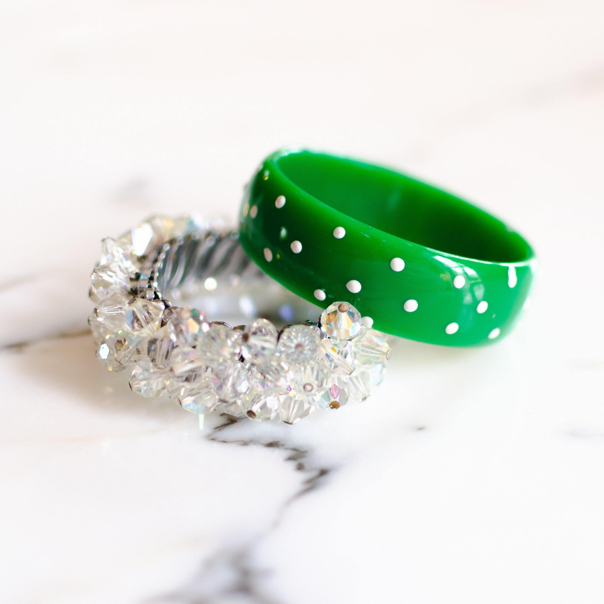 1980s Green and White Polka Dot Lucite Bangle Bracelet by Vintage Meet Modern - Vintage Meet Modern Vintage Jewelry - Chicago, Illinois - #oldhollywoodglamour #vintagemeetmodern #designervintage #jewelrybox #antiquejewelry #vintagejewelry