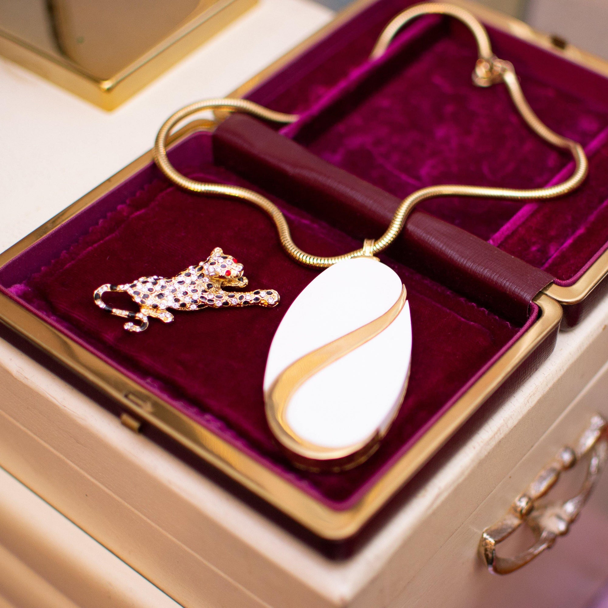 Vintage Alice Caviness White Lucite and Gold Mod Statement Pendant Necklace by Vintage Meet Modern - Vintage Meet Modern Vintage Jewelry - Chicago, Illinois - #oldhollywoodglamour #vintagemeetmodern #designervintage #jewelrybox #antiquejewelry #vintagejewelry
