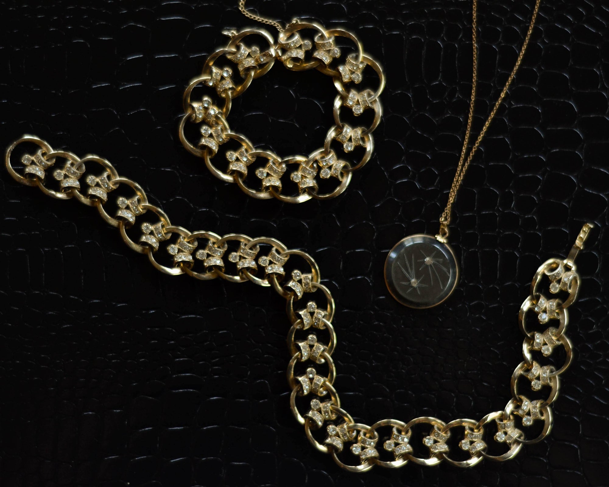 Gold Scroll Link Bracelet with Diamante Rhinestones by 1950s - Vintage Meet Modern Vintage Jewelry - Chicago, Illinois - #oldhollywoodglamour #vintagemeetmodern #designervintage #jewelrybox #antiquejewelry #vintagejewelry