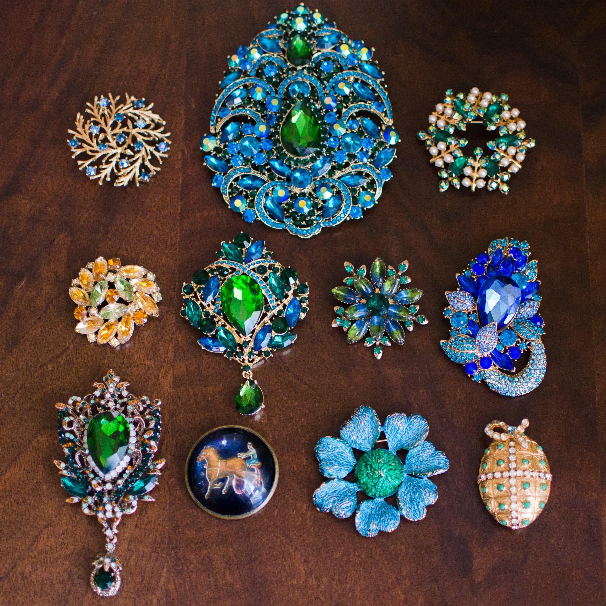 Massive Blue and Emerald Green Rhinestone Brooch by Vintage Meet Modern - Vintage Meet Modern Vintage Jewelry - Chicago, Illinois - #oldhollywoodglamour #vintagemeetmodern #designervintage #jewelrybox #antiquejewelry #vintagejewelry