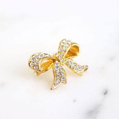 Vintage Gold Rhinestone Bow Brooch by Unsigned Beauty - Vintage Meet Modern Vintage Jewelry - Chicago, Illinois - #oldhollywoodglamour #vintagemeetmodern #designervintage #jewelrybox #antiquejewelry #vintagejewelry