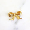Vintage Gold Rhinestone Bow Brooch by Unsigned Beauty - Vintage Meet Modern Vintage Jewelry - Chicago, Illinois - #oldhollywoodglamour #vintagemeetmodern #designervintage #jewelrybox #antiquejewelry #vintagejewelry