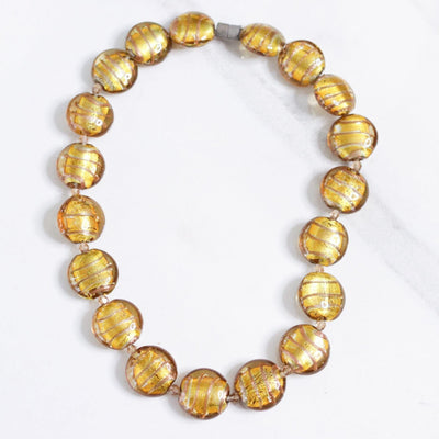 Vintage Venetian Glass Gold Flat Button Bead Necklace by Unsigned Beauty - Vintage Meet Modern Vintage Jewelry - Chicago, Illinois - #oldhollywoodglamour #vintagemeetmodern #designervintage #jewelrybox #antiquejewelry #vintagejewelry