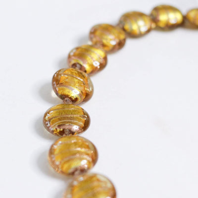 Vintage Venetian Glass Gold Flat Button Bead Necklace by Unsigned Beauty - Vintage Meet Modern Vintage Jewelry - Chicago, Illinois - #oldhollywoodglamour #vintagemeetmodern #designervintage #jewelrybox #antiquejewelry #vintagejewelry