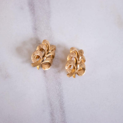 Vintage Sarah Coventry Gold Scroll Leaf Designer Earrings by Sarah Coventry - Vintage Meet Modern Vintage Jewelry - Chicago, Illinois - #oldhollywoodglamour #vintagemeetmodern #designervintage #jewelrybox #antiquejewelry #vintagejewelry