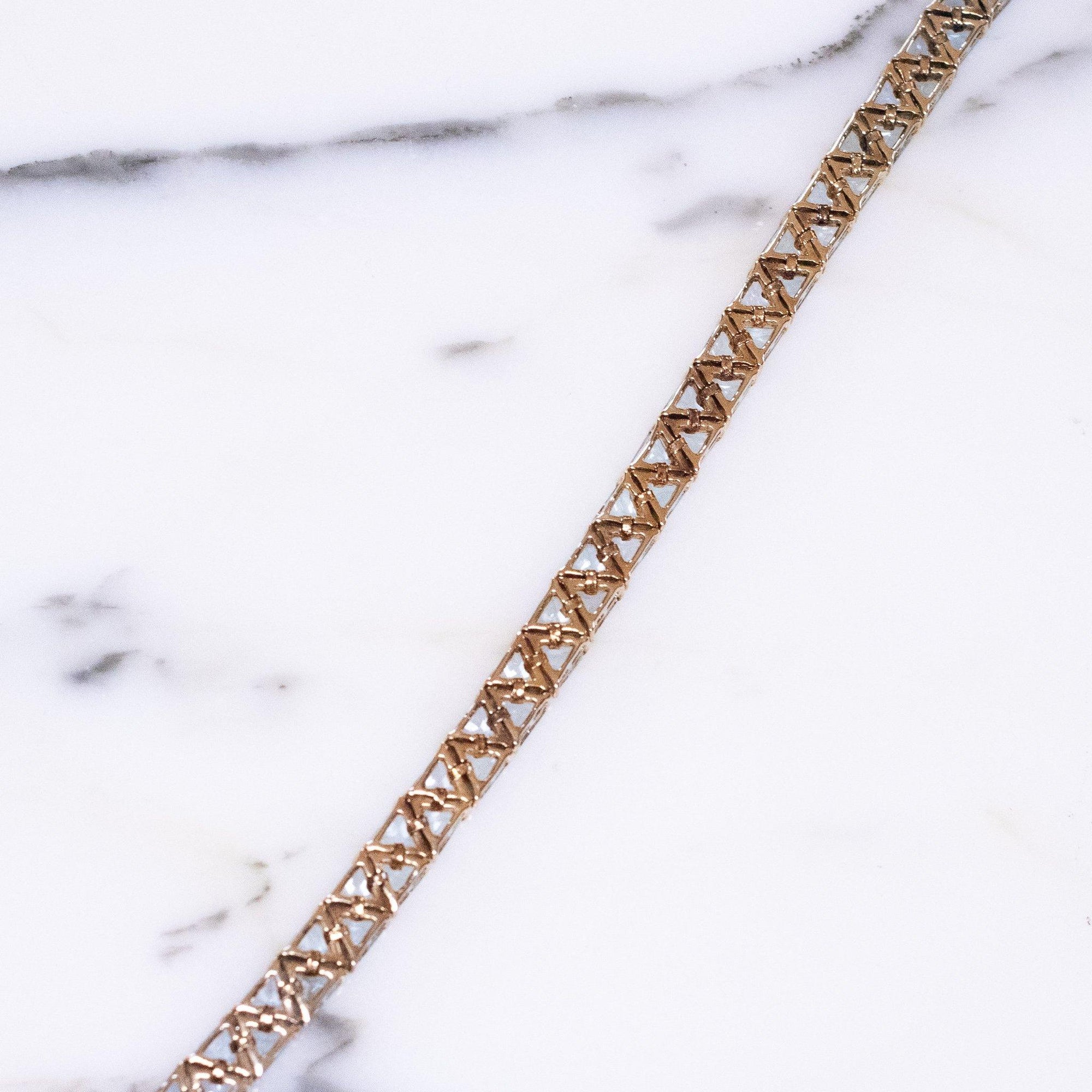 Vintage Suzanne Somers  Blue Topaz Trillion CZ Cut 18kt Gold Over Sterling Silver Tennis Bracelet by Suzanne Somers - Vintage Meet Modern Vintage Jewelry - Chicago, Illinois - #oldhollywoodglamour #vintagemeetmodern #designervintage #jewelrybox #antiquejewelry #vintagejewelry