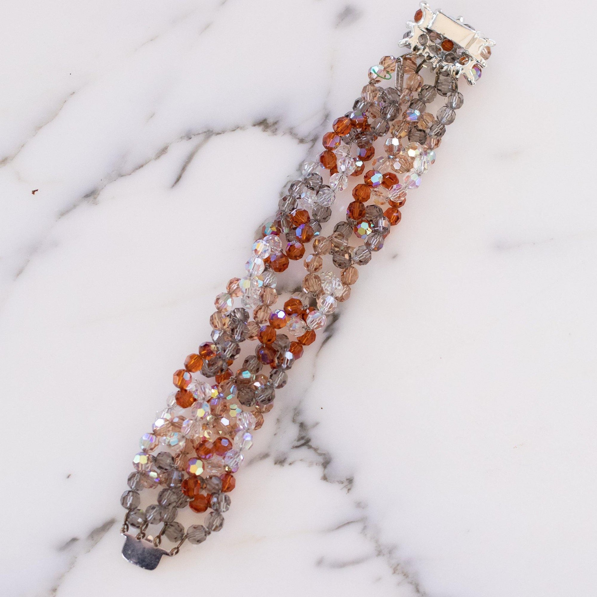 Vintage Vendome Looped Aurora Borealis, Amber, and Smoke Faceted Crystal Bead Bracelet with Rhinestones Clasp by Vintage Meet Modern - Vintage Meet Modern Vintage Jewelry - Chicago, Illinois - #oldhollywoodglamour #vintagemeetmodern #designervintage #jewelrybox #antiquejewelry #vintagejewelry