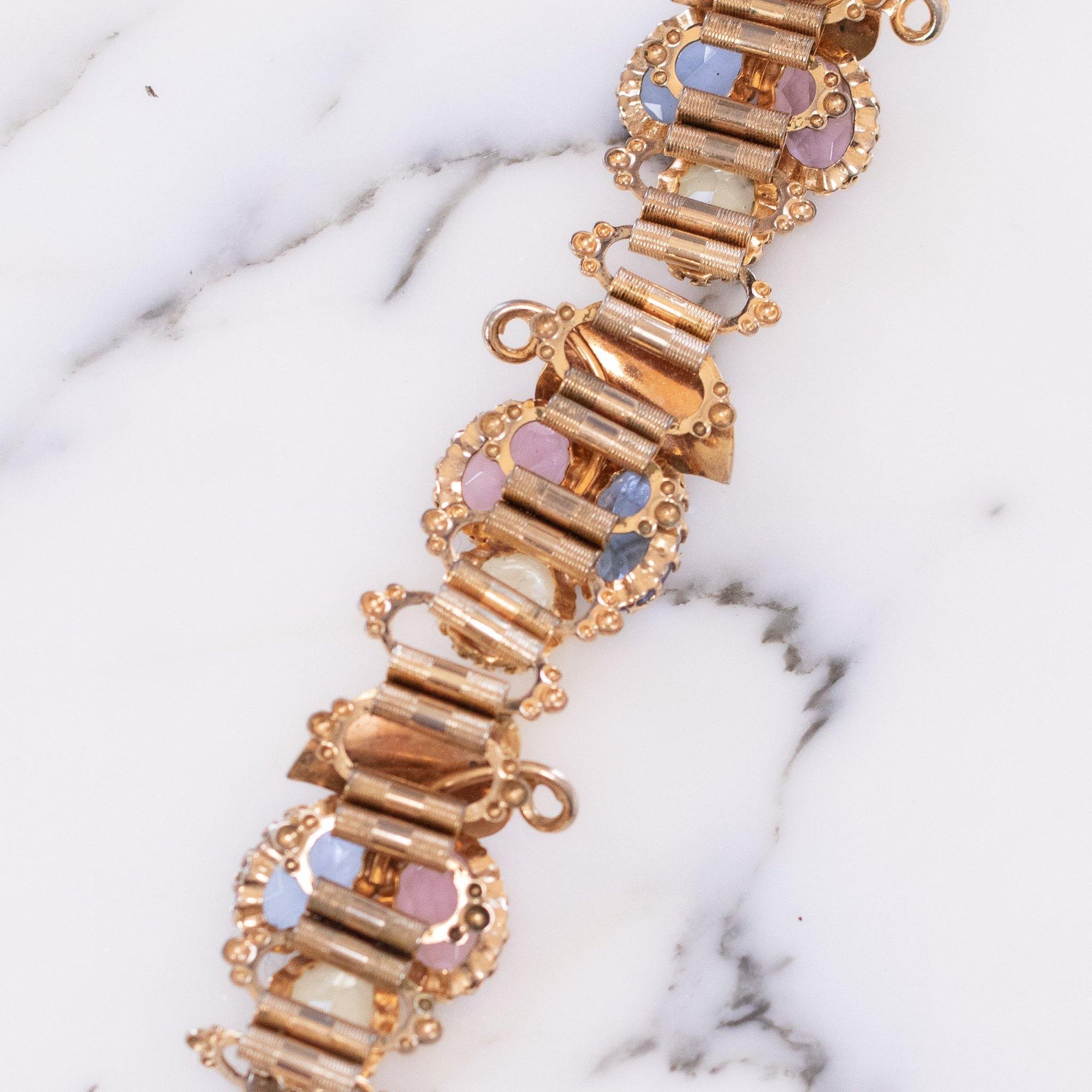 Vintage Blue, Rose, and Lemon Yellow Rhinestone Book Chain Bracelet with Leaf Details by Vintage Meet Modern - Vintage Meet Modern Vintage Jewelry - Chicago, Illinois - #oldhollywoodglamour #vintagemeetmodern #designervintage #jewelrybox #antiquejewelry #vintagejewelry