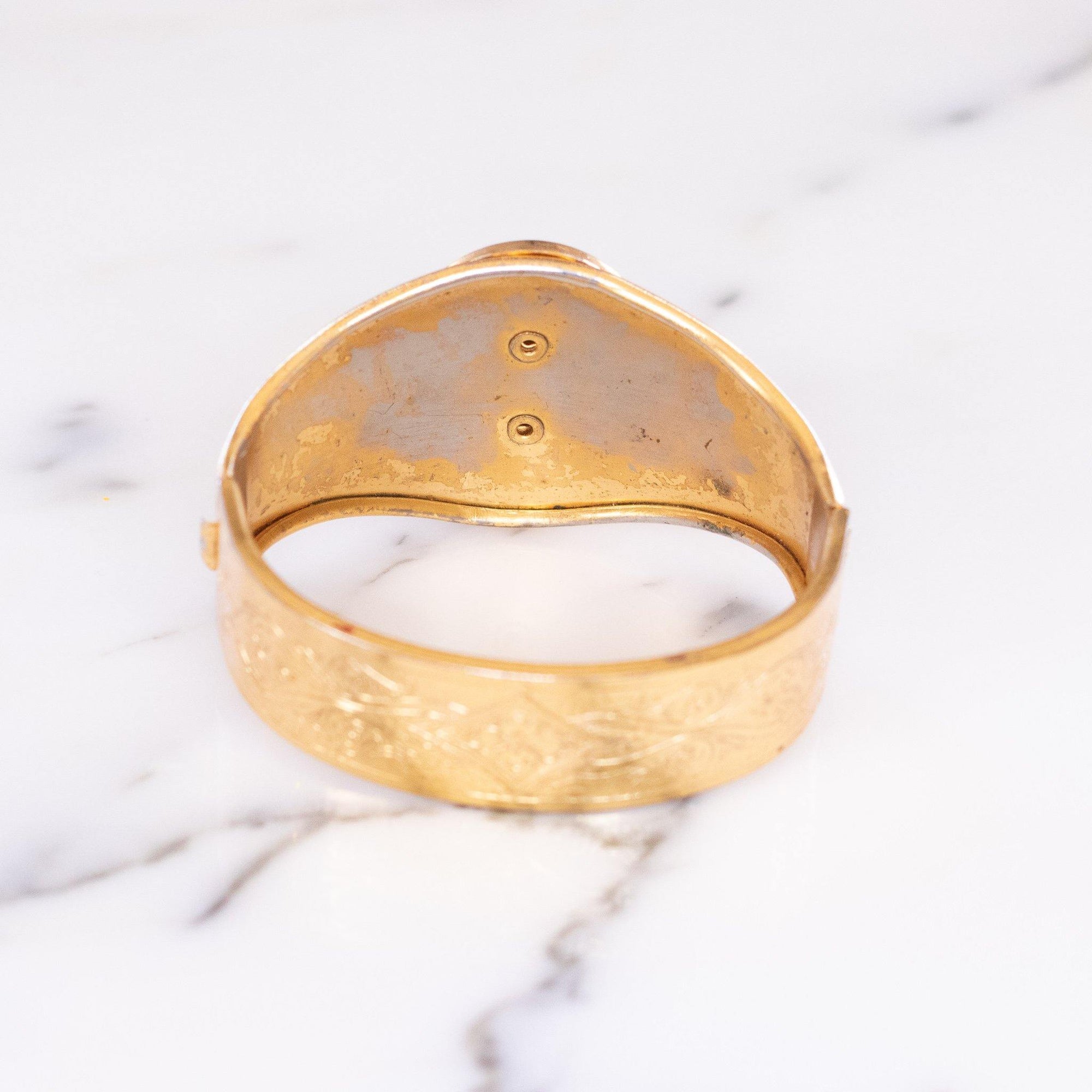 Vintage Czech Gold Tone Embossed Cuff Bracelet with Black Lucite Cameo by Czech - Vintage Meet Modern Vintage Jewelry - Chicago, Illinois - #oldhollywoodglamour #vintagemeetmodern #designervintage #jewelrybox #antiquejewelry #vintagejewelry