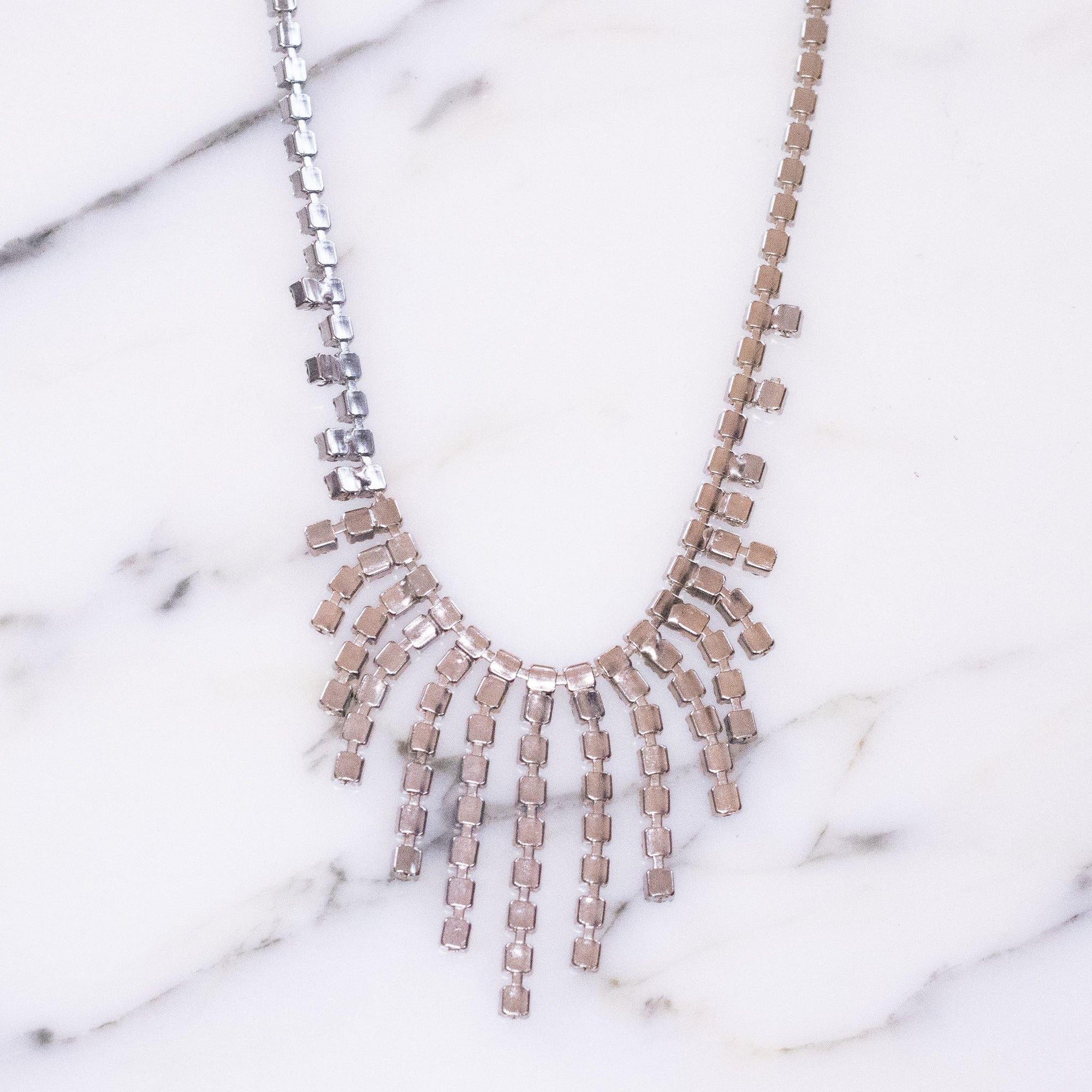 Vintage Cinderella Light Blue Rhinestone Fringed Bib Necklace, Silver Tone, Fish Hook Necklace, Dangle by 1950s - Vintage Meet Modern Vintage Jewelry - Chicago, Illinois - #oldhollywoodglamour #vintagemeetmodern #designervintage #jewelrybox #antiquejewelry #vintagejewelry