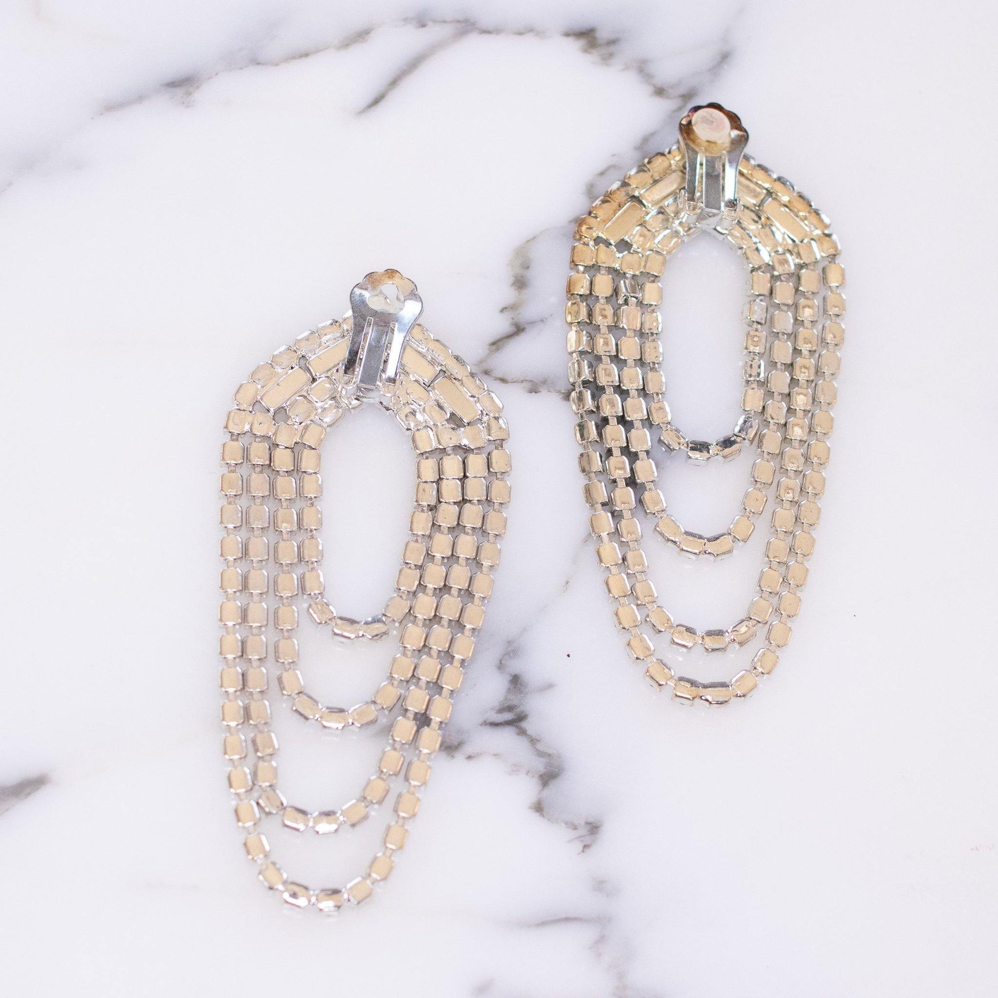 1960s Looped Waterfall Style Diamante Crystal Statement Earrings by Vintage Meet Modern - Vintage Meet Modern Vintage Jewelry - Chicago, Illinois - #oldhollywoodglamour #vintagemeetmodern #designervintage #jewelrybox #antiquejewelry #vintagejewelry