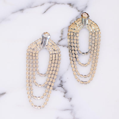 1960s Looped Waterfall Style Diamante Crystal Statement Earrings by Vintage Meet Modern - Vintage Meet Modern Vintage Jewelry - Chicago, Illinois - #oldhollywoodglamour #vintagemeetmodern #designervintage #jewelrybox #antiquejewelry #vintagejewelry