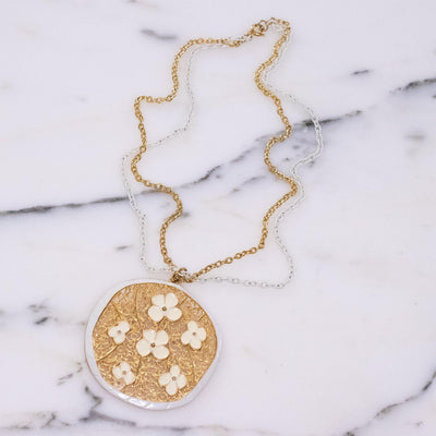 Vintage 1960s Gold Pendant Necklace with Daisies by Vintage Meet Modern  - Vintage Meet Modern Vintage Jewelry - Chicago, Illinois - #oldhollywoodglamour #vintagemeetmodern #designervintage #jewelrybox #antiquejewelry #vintagejewelry