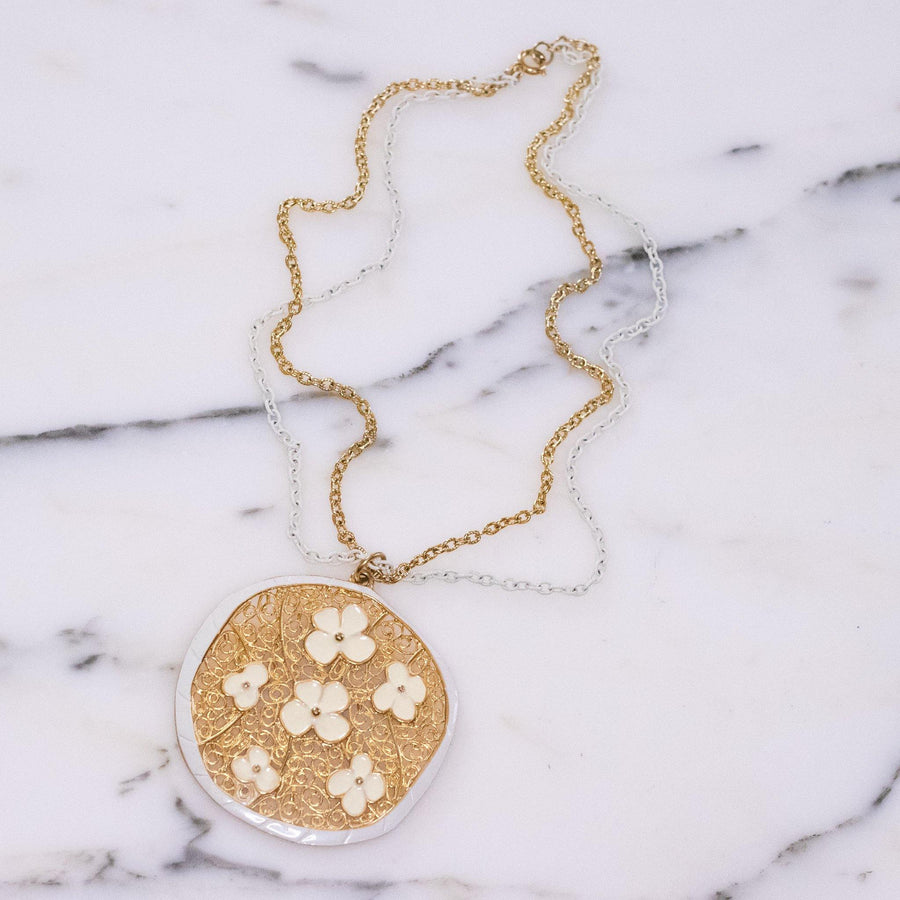Vintage 1960s Gold Pendant Necklace with Daisies by Vintage Meet Modern - Vintage Meet Modern Vintage Jewelry - Chicago, Illinois - #oldhollywoodglamour #vintagemeetmodern #designervintage #jewelrybox #antiquejewelry #vintagejewelry