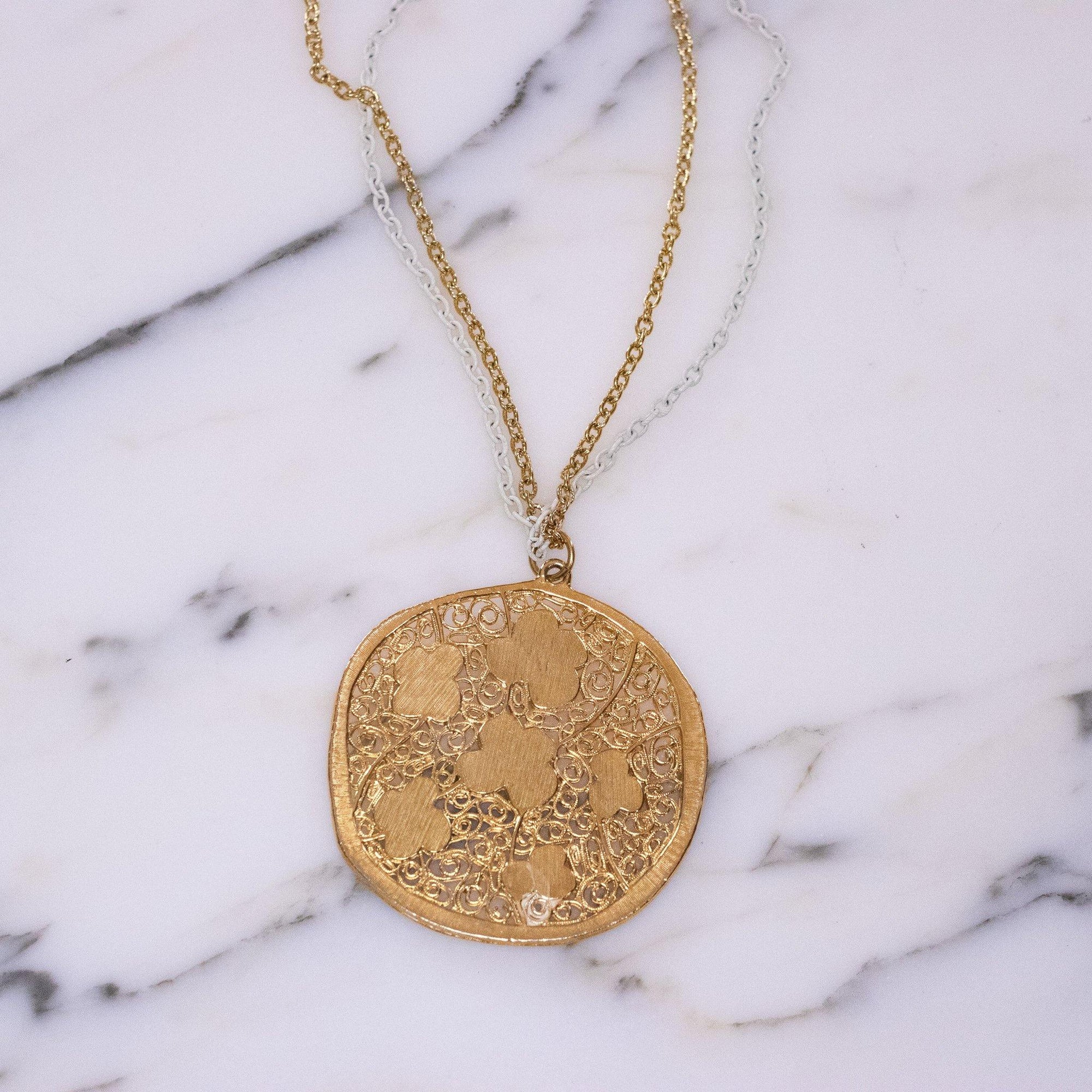 Vintage 1960s Gold Pendant Necklace with Daisies by Vintage Meet Modern - Vintage Meet Modern Vintage Jewelry - Chicago, Illinois - #oldhollywoodglamour #vintagemeetmodern #designervintage #jewelrybox #antiquejewelry #vintagejewelry