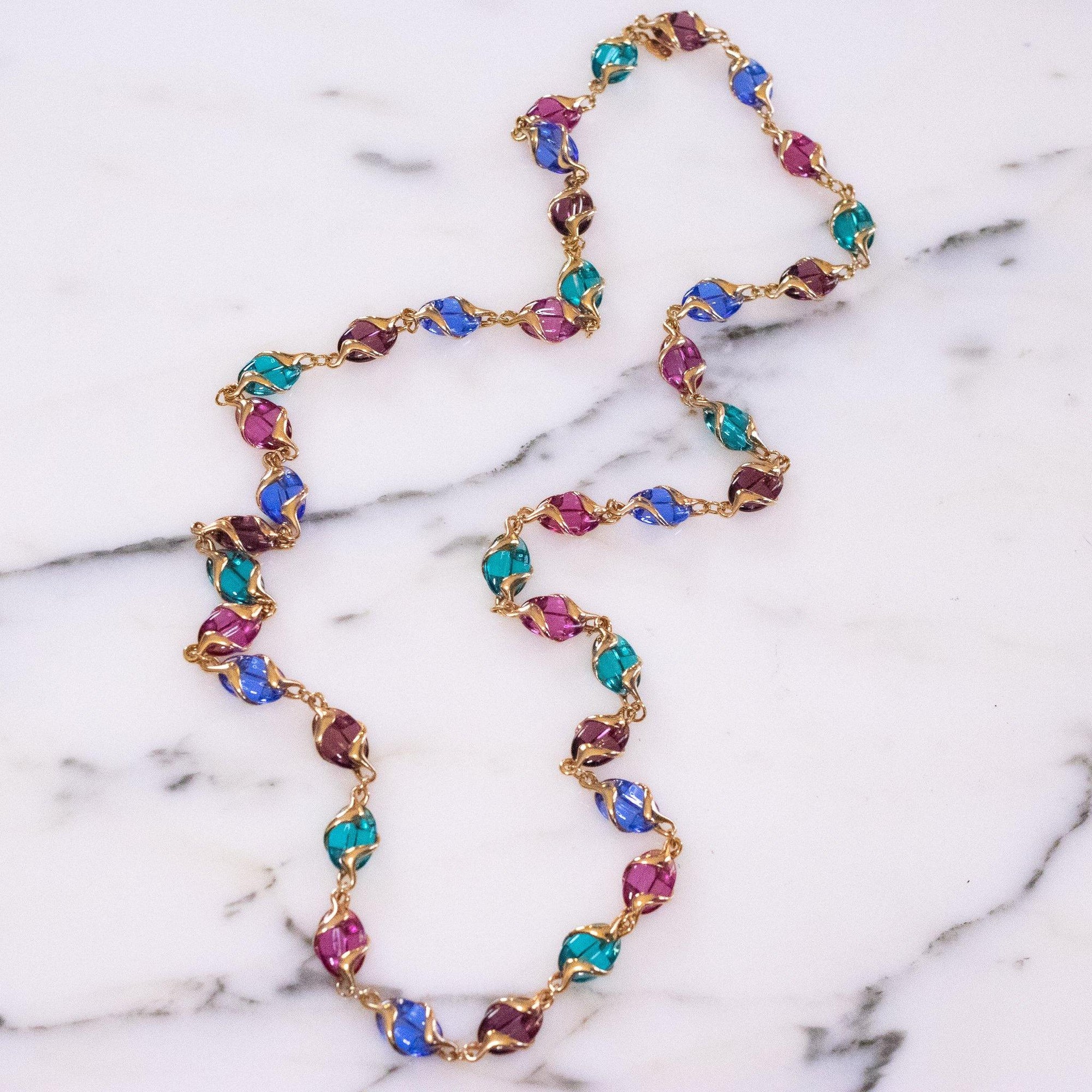 Vintage Swarovski Poured Crystal Jewel Tone Necklace Red Blue and Green by Swarovski - Vintage Meet Modern Vintage Jewelry - Chicago, Illinois - #oldhollywoodglamour #vintagemeetmodern #designervintage #jewelrybox #antiquejewelry #vintagejewelry