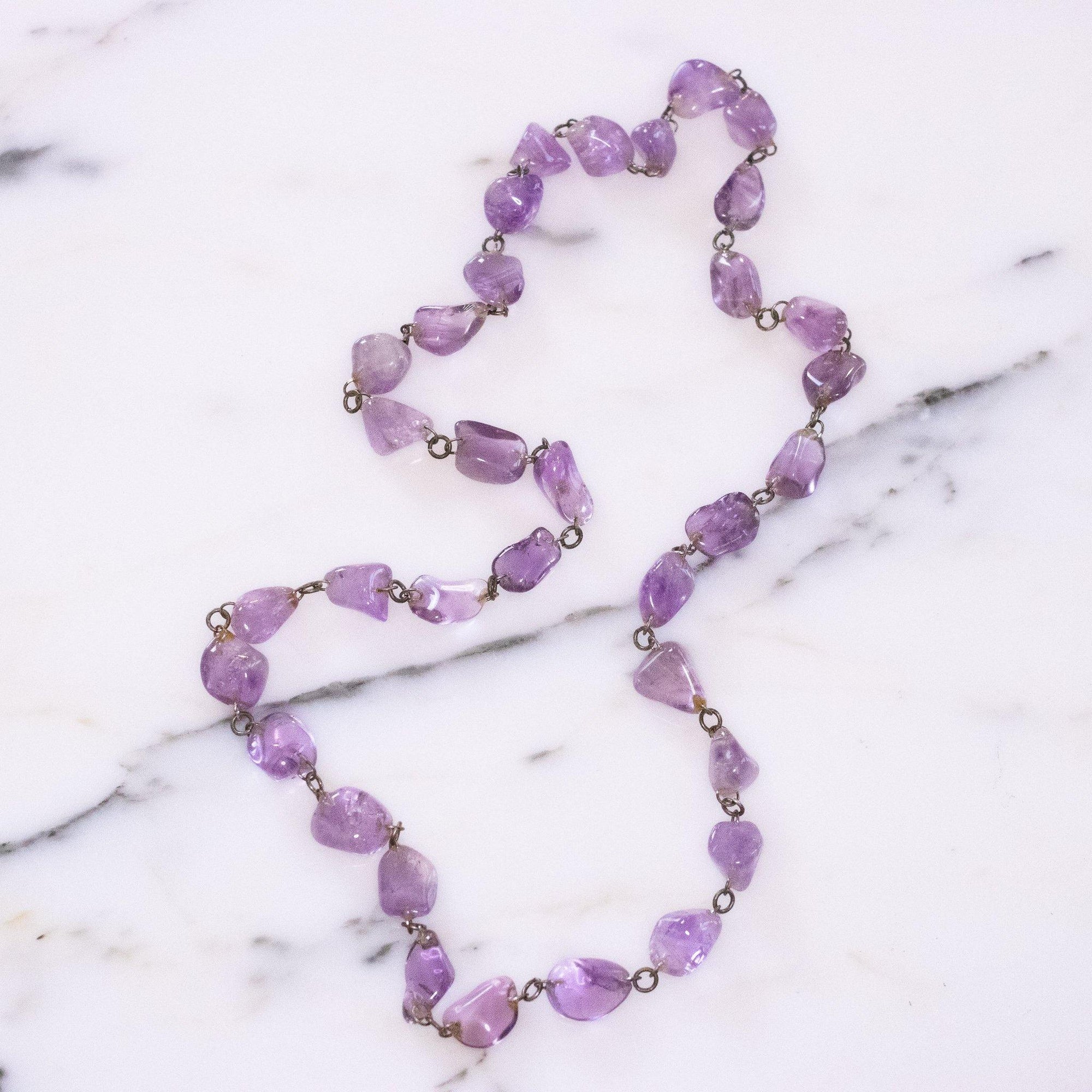 Vintage Tumbled Amethyst Beaded Necklace by Vintage Meet Modern - Vintage Meet Modern Vintage Jewelry - Chicago, Illinois - #oldhollywoodglamour #vintagemeetmodern #designervintage #jewelrybox #antiquejewelry #vintagejewelry