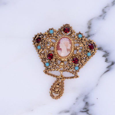 Vintage Florenza Crown Brooch with Cameo and Turquoise Beads and Garnet Red Rhinestones by Vintage Meet Modern  - Vintage Meet Modern Vintage Jewelry - Chicago, Illinois - #oldhollywoodglamour #vintagemeetmodern #designervintage #jewelrybox #antiquejewelry #vintagejewelry