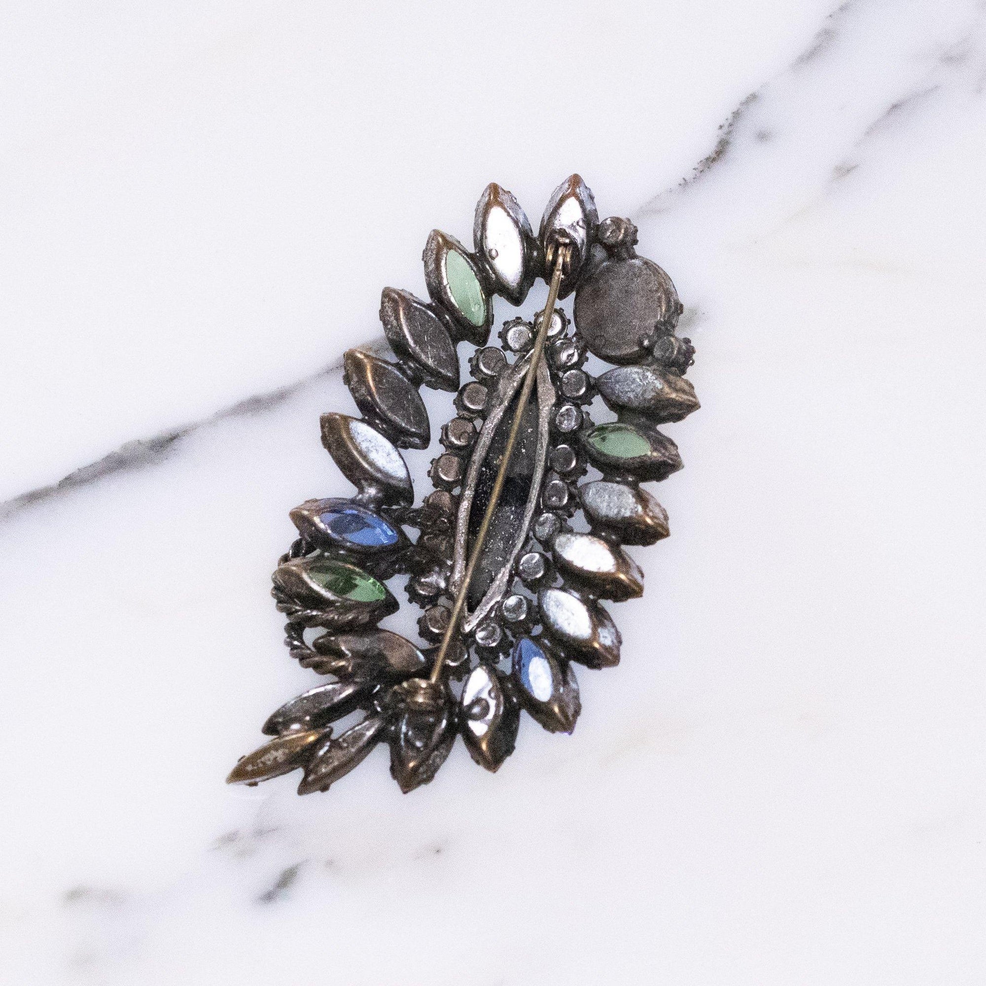 Vintage Jet Heamtite Sapphire Blue and Green Rhinestone Brooch by Unsigned Beauty - Vintage Meet Modern Vintage Jewelry - Chicago, Illinois - #oldhollywoodglamour #vintagemeetmodern #designervintage #jewelrybox #antiquejewelry #vintagejewelry