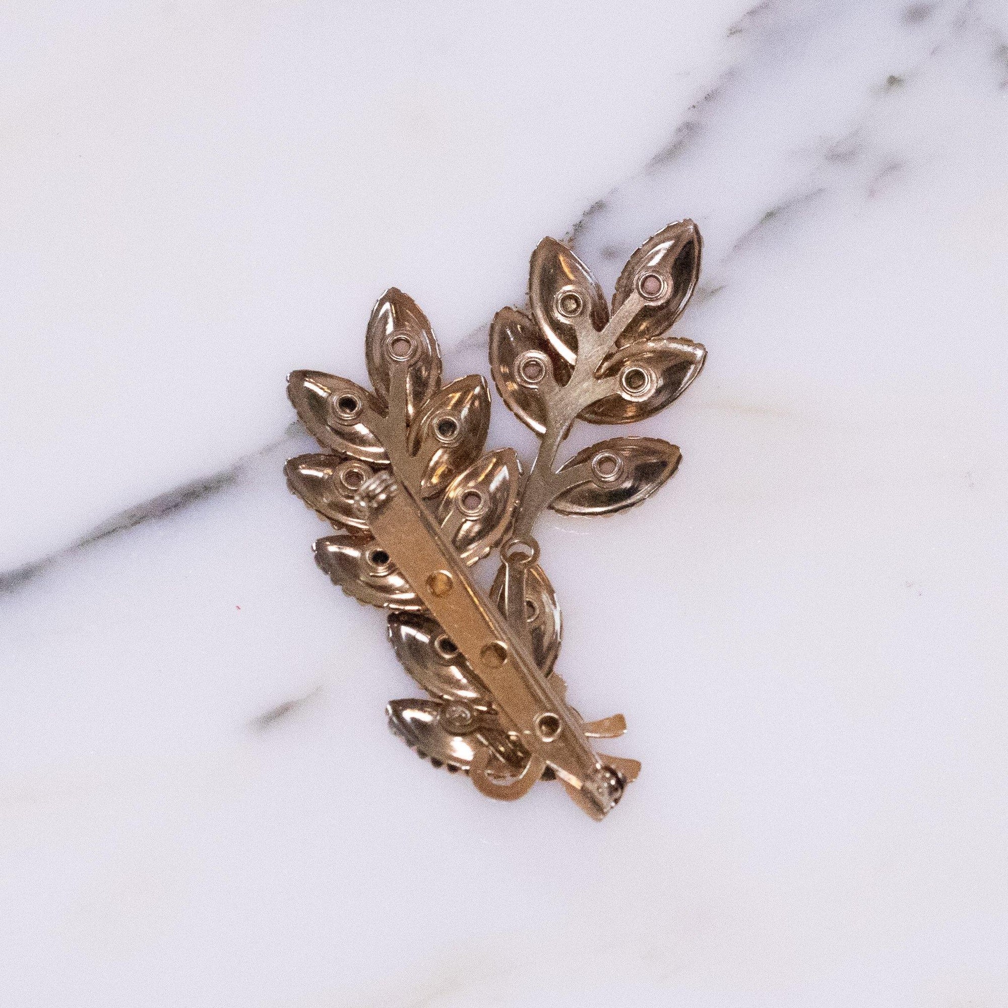 Pink and Red Rhinestone Leaf Brooch by Vintage Meet Modern - Vintage Meet Modern Vintage Jewelry - Chicago, Illinois - #oldhollywoodglamour #vintagemeetmodern #designervintage #jewelrybox #antiquejewelry #vintagejewelry