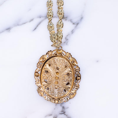 Vintage West Germany Gilt Filigree Pendant Necklace with Red Crystal, Pink Rhinestones and Faux Pearls by Vintage Meet Modern  - Vintage Meet Modern Vintage Jewelry - Chicago, Illinois - #oldhollywoodglamour #vintagemeetmodern #designervintage #jewelrybox #antiquejewelry #vintagejewelry