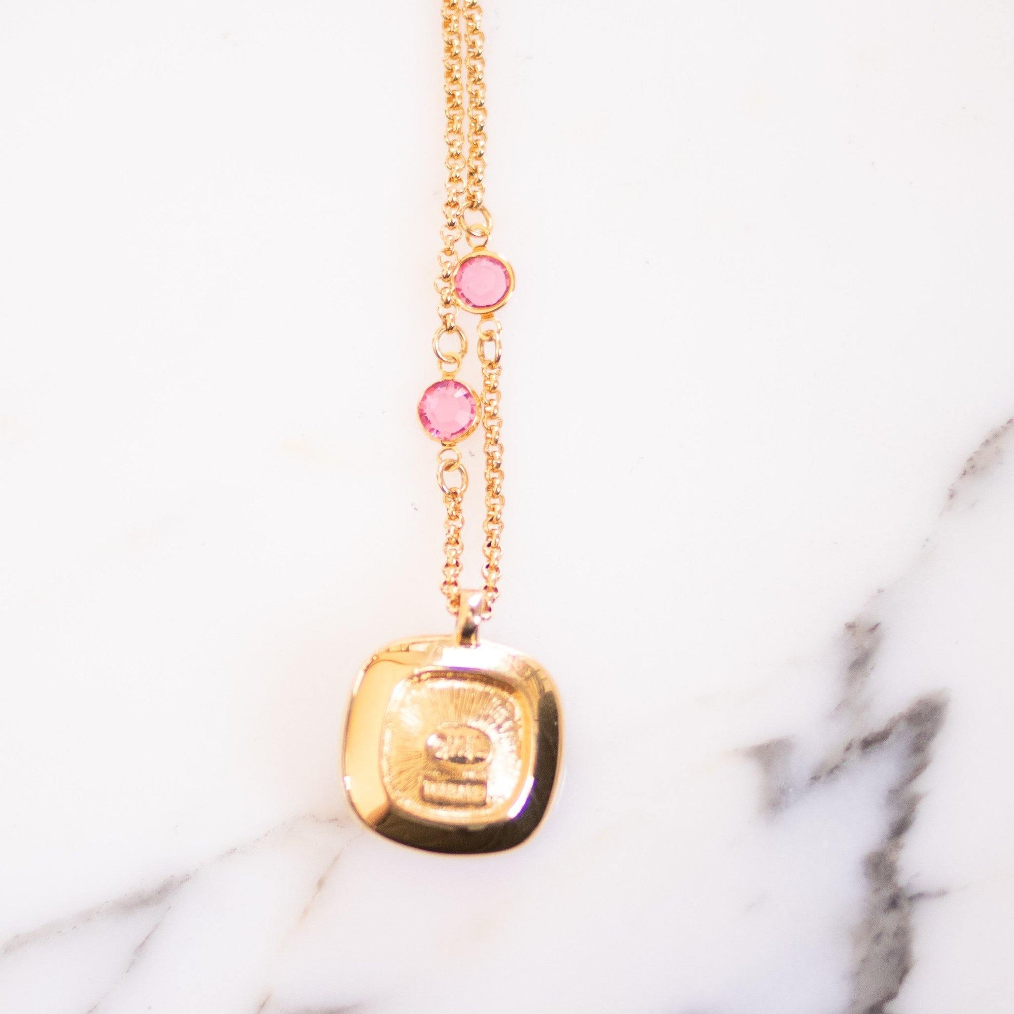 Vintage Kenneth Jay Lane Necklace and Pendant, Pink Rhinestones, Purple Rhinestones, Clear Rhinestones, Gold Tone Necklace, Lobster Clasp by Kenneth Jay Lane - Vintage Meet Modern Vintage Jewelry - Chicago, Illinois - #oldhollywoodglamour #vintagemeetmodern #designervintage #jewelrybox #antiquejewelry #vintagejewelry