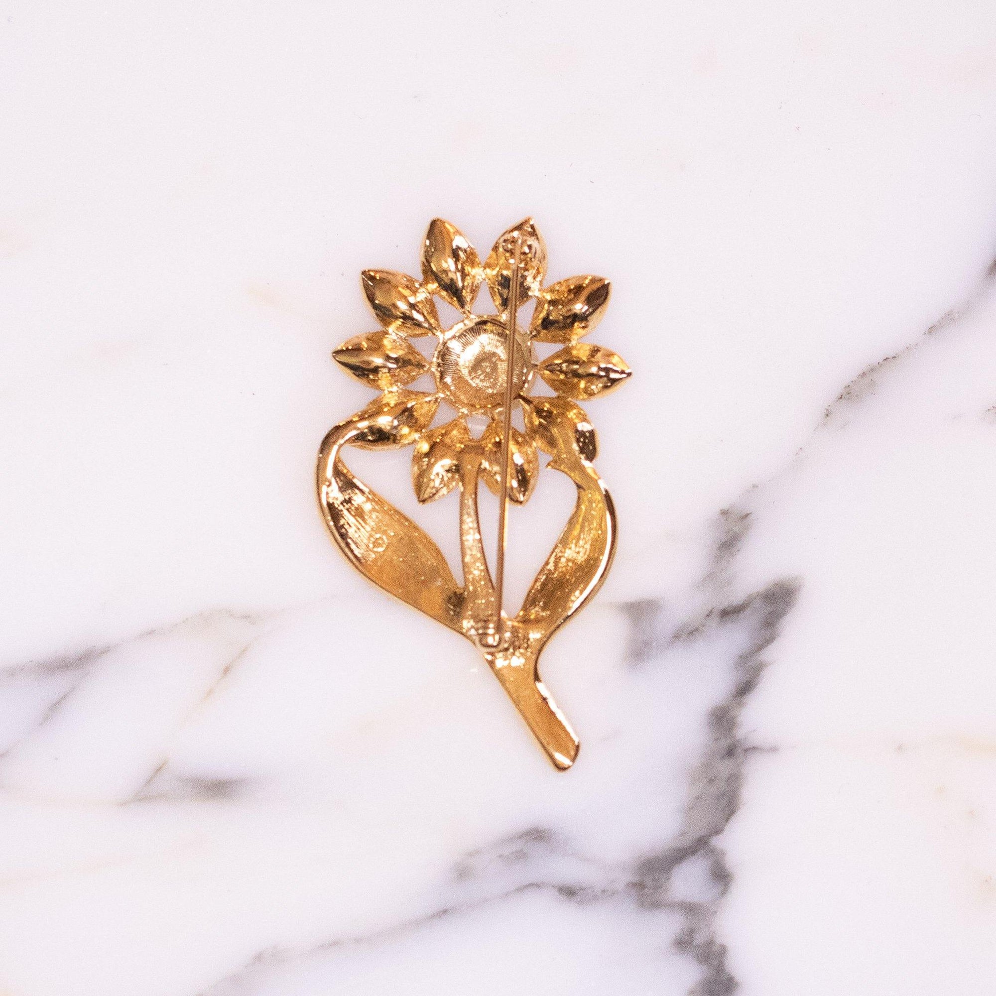 Vintage Avon Flower Brooch Gold, Blue, and Pink Rhinestone Brooch by Avon - Vintage Meet Modern Vintage Jewelry - Chicago, Illinois - #oldhollywoodglamour #vintagemeetmodern #designervintage #jewelrybox #antiquejewelry #vintagejewelry