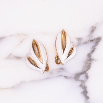 Vintage Crown Trifari Gold Tone White Enamel Leaf Earrings by Crown Trifari - Vintage Meet Modern Vintage Jewelry - Chicago, Illinois - #oldhollywoodglamour #vintagemeetmodern #designervintage #jewelrybox #antiquejewelry #vintagejewelry