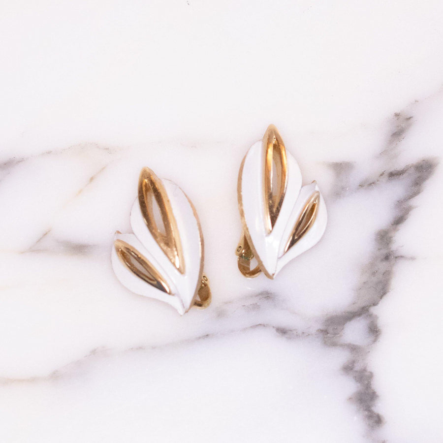 Vintage Crown Trifari Gold Tone White Enamel Leaf Earrings by Crown Trifari - Vintage Meet Modern Vintage Jewelry - Chicago, Illinois - #oldhollywoodglamour #vintagemeetmodern #designervintage #jewelrybox #antiquejewelry #vintagejewelry