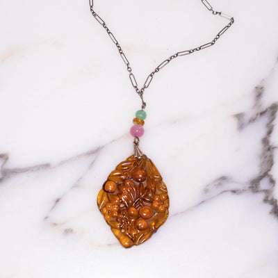 Vintage Art Deco Czech Pressed Amber Glass Pendant Necklace with Jade and Pink Beads by Czech - Vintage Meet Modern Vintage Jewelry - Chicago, Illinois - #oldhollywoodglamour #vintagemeetmodern #designervintage #jewelrybox #antiquejewelry #vintagejewelry