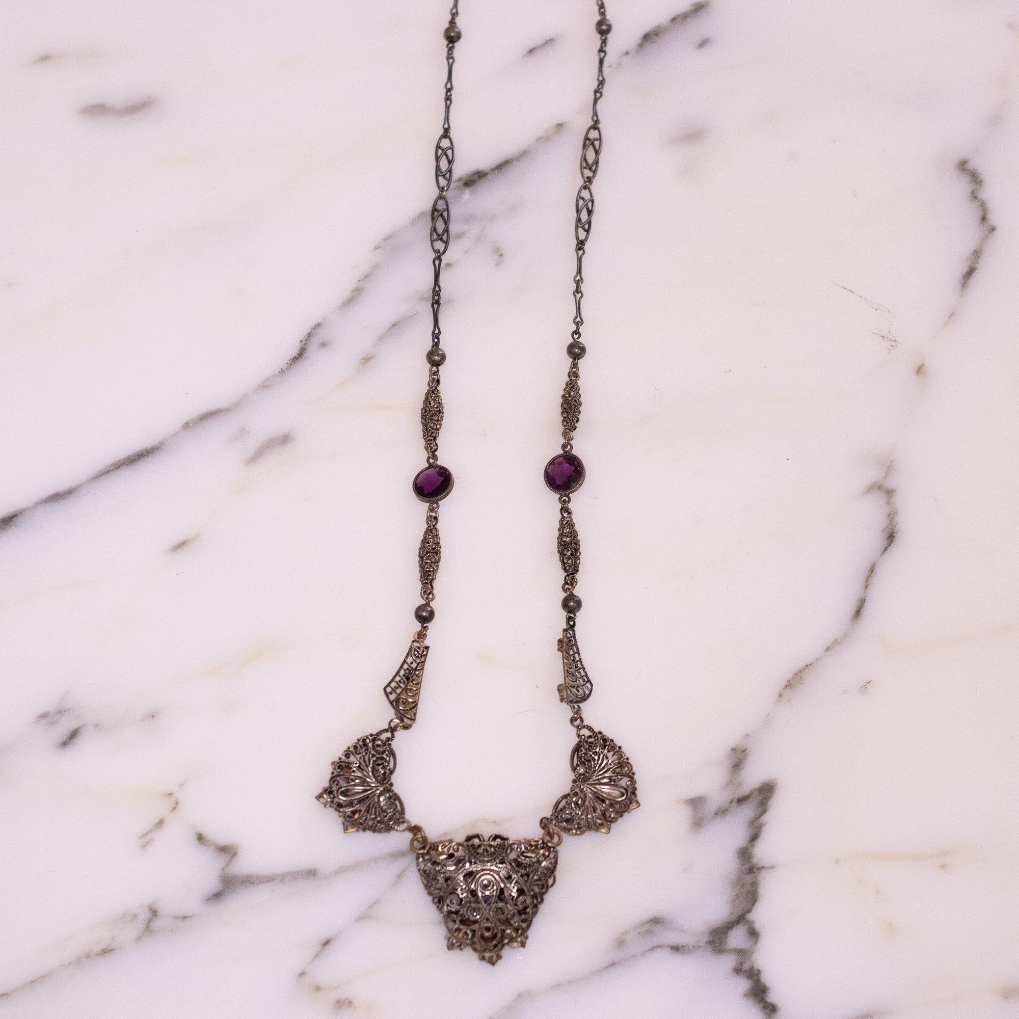 Vintage Purple Amethyst Crystal and Silver Filigree Statement Necklace by Czech - Vintage Meet Modern Vintage Jewelry - Chicago, Illinois - #oldhollywoodglamour #vintagemeetmodern #designervintage #jewelrybox #antiquejewelry #vintagejewelry