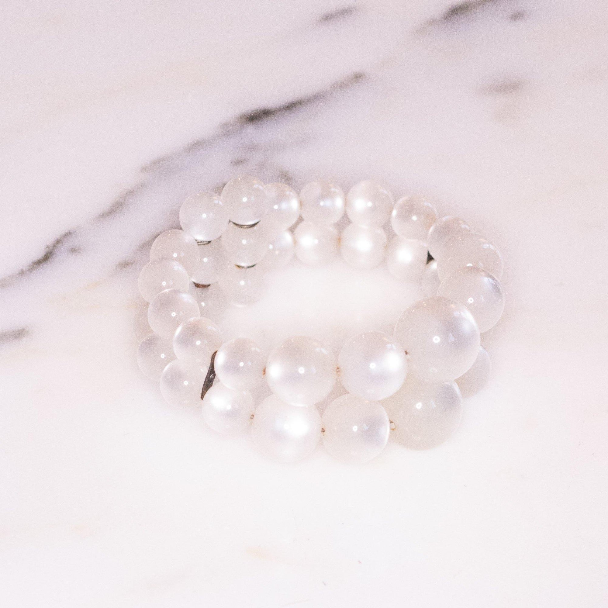 Vintage Lucite White Moonglow Double Strand Expansion Bracelet by Unsigned Beauty - Vintage Meet Modern Vintage Jewelry - Chicago, Illinois - #oldhollywoodglamour #vintagemeetmodern #designervintage #jewelrybox #antiquejewelry #vintagejewelry