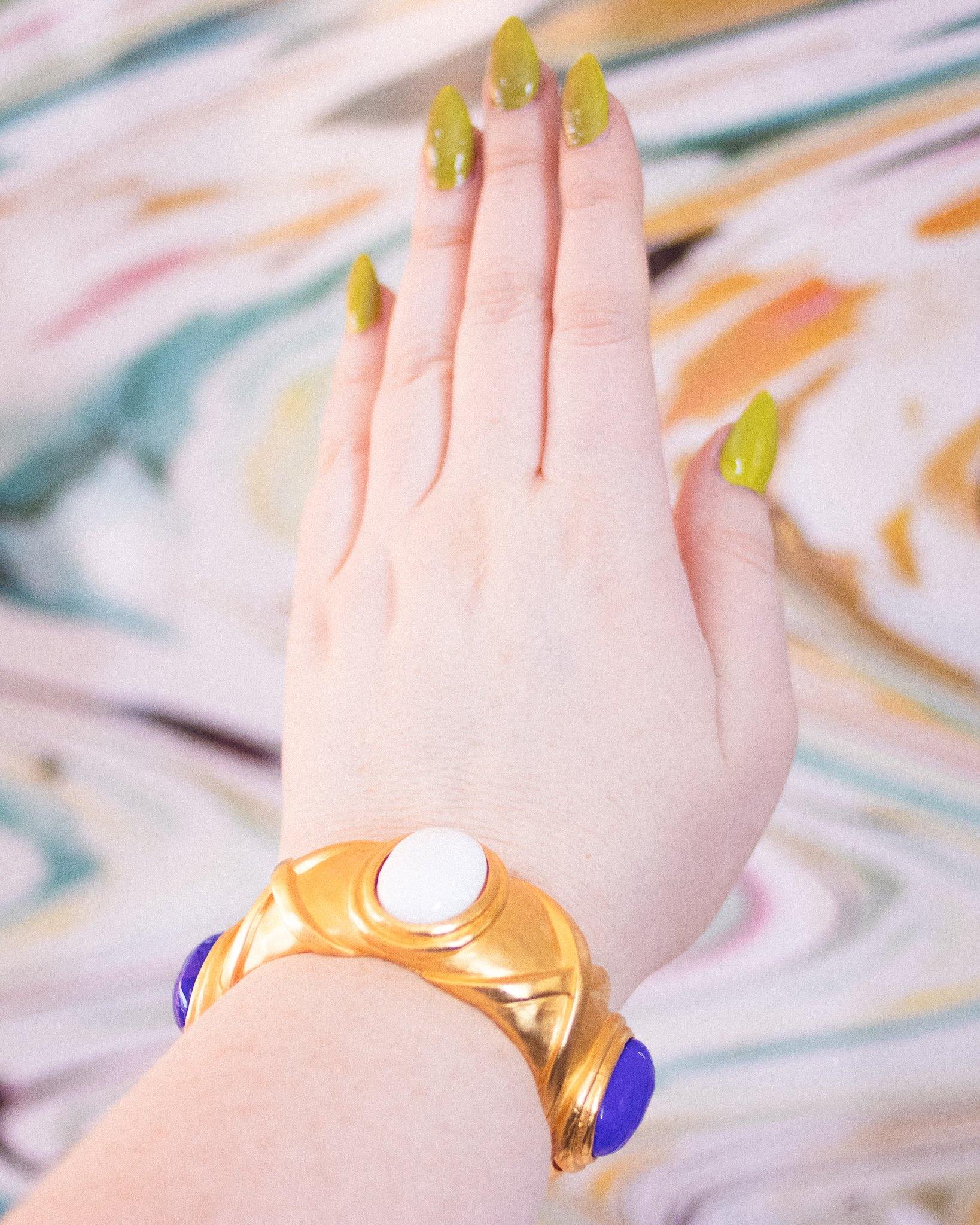 Vintage Karl Lagerfeld Couture Brushed Gold Bangle with White and Lapis Blue Glass Cabochons by Karl Lagerfeld - Vintage Meet Modern Vintage Jewelry - Chicago, Illinois - #oldhollywoodglamour #vintagemeetmodern #designervintage #jewelrybox #antiquejewelry #vintagejewelry