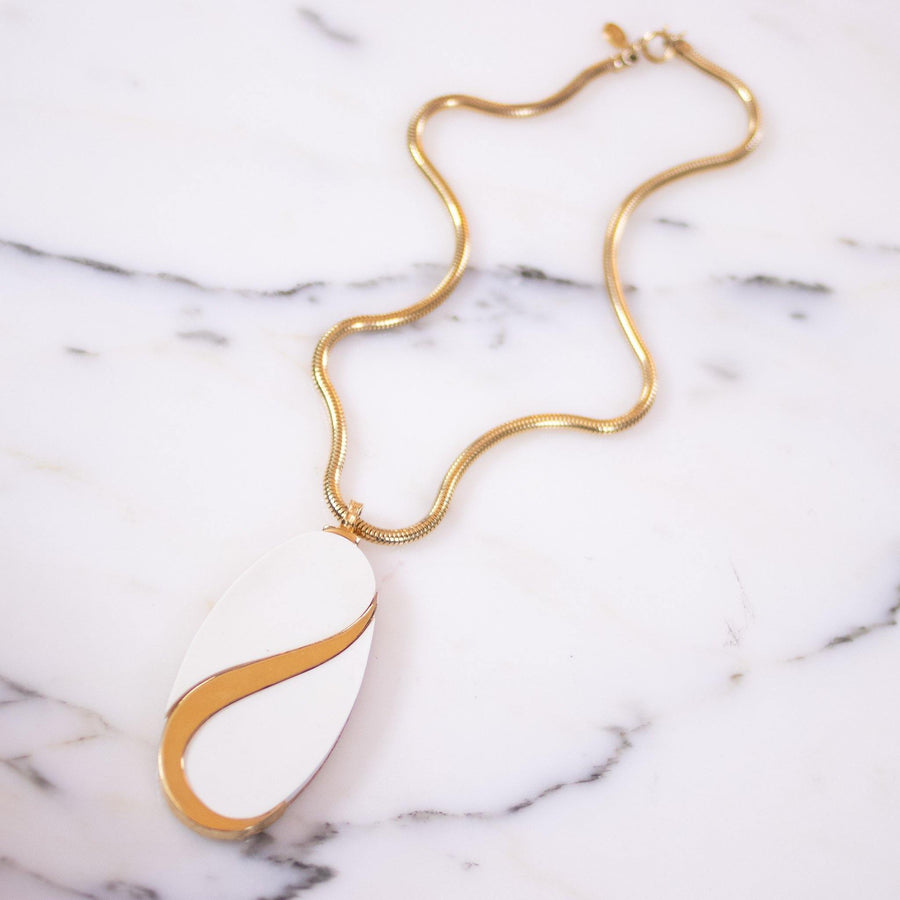 Vintage Alice Caviness White Lucite and Gold Mod Statement Pendant Necklace by Vintage Meet Modern - Vintage Meet Modern Vintage Jewelry - Chicago, Illinois - #oldhollywoodglamour #vintagemeetmodern #designervintage #jewelrybox #antiquejewelry #vintagejewelry