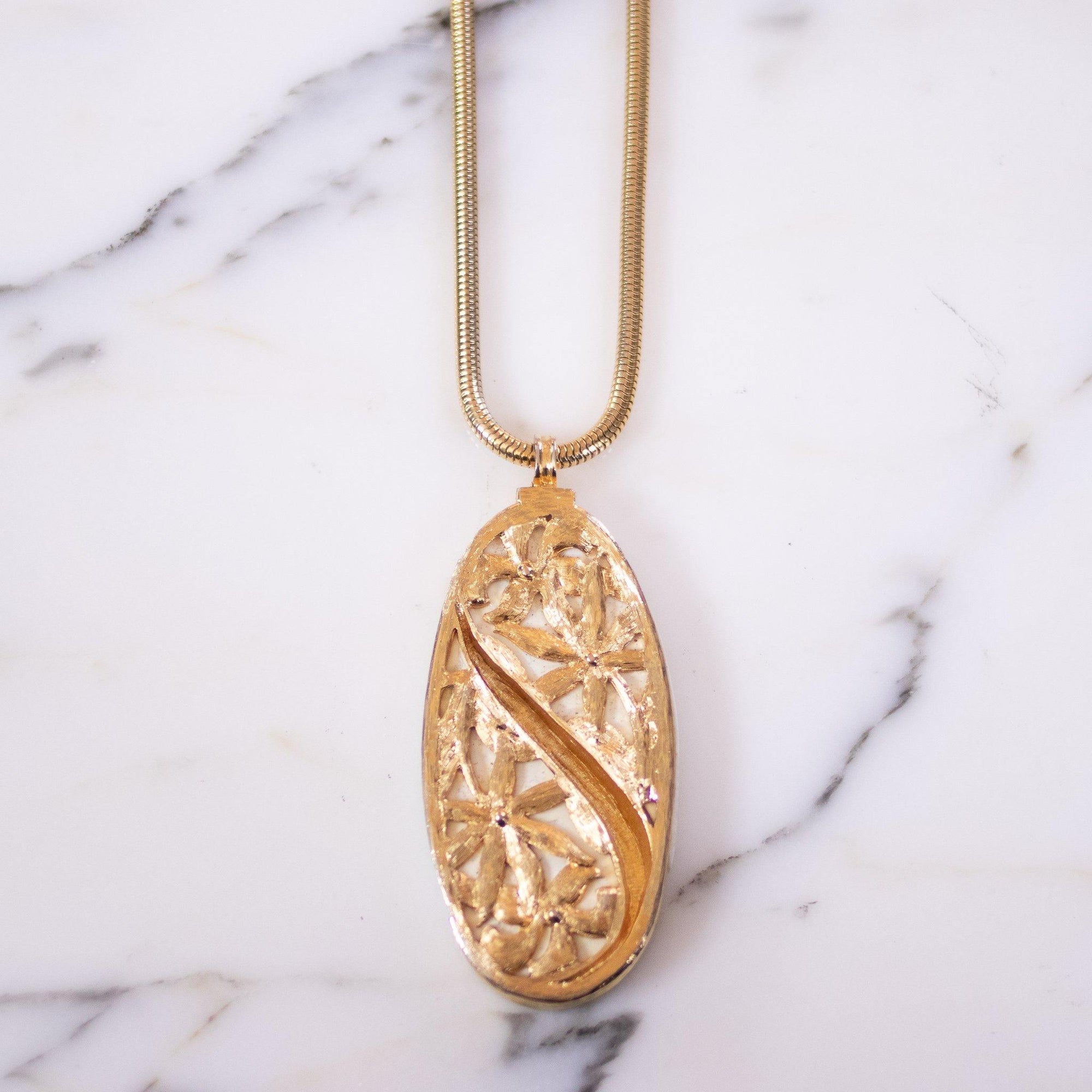 Vintage Alice Caviness White Lucite and Gold Mod Statement Pendant Necklace by Vintage Meet Modern - Vintage Meet Modern Vintage Jewelry - Chicago, Illinois - #oldhollywoodglamour #vintagemeetmodern #designervintage #jewelrybox #antiquejewelry #vintagejewelry