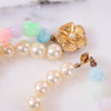 Vintage Faux Pearl and Green, Pink, Purple, Blue Bead Double Strand Necklace by Unsigned Beauty - Vintage Meet Modern Vintage Jewelry - Chicago, Illinois - #oldhollywoodglamour #vintagemeetmodern #designervintage #jewelrybox #antiquejewelry #vintagejewelry