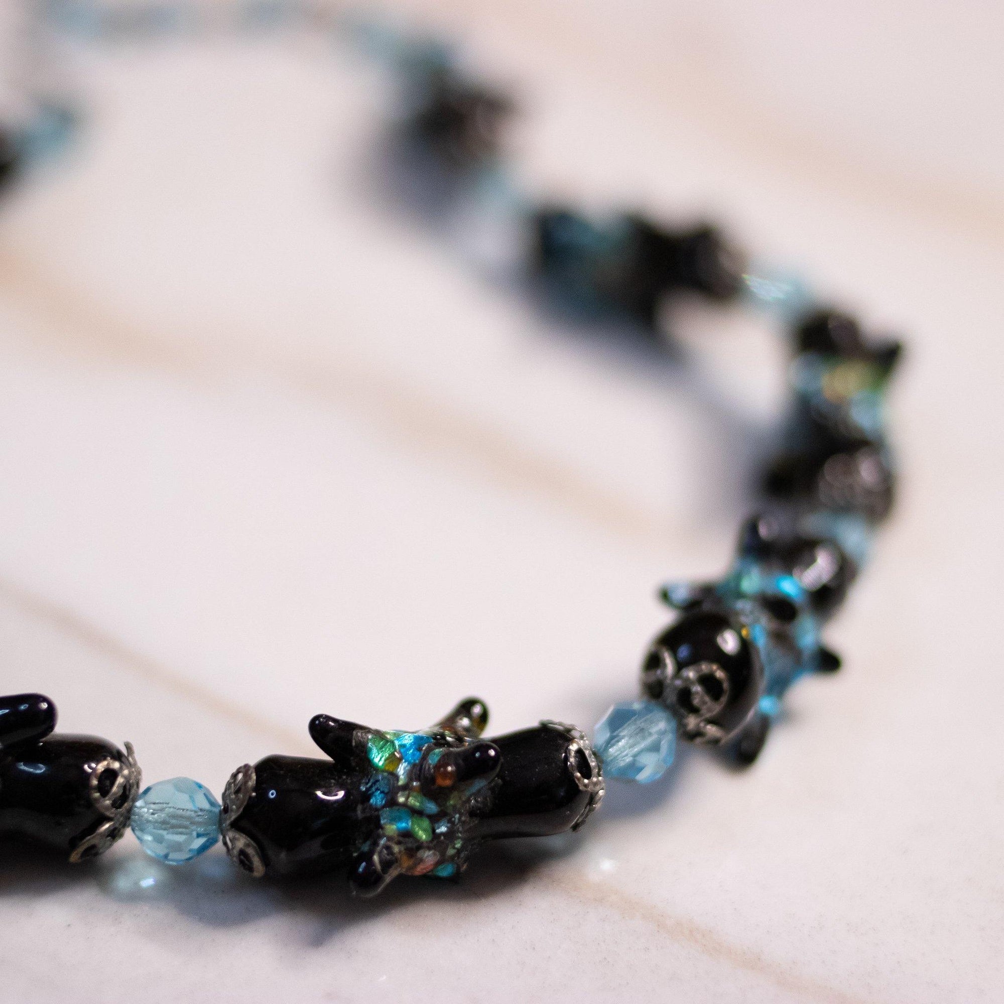 Vintage Black and Blue Venetian Glass Bead Necklace by Italian Lampwork - Vintage Meet Modern Vintage Jewelry - Chicago, Illinois - #oldhollywoodglamour #vintagemeetmodern #designervintage #jewelrybox #antiquejewelry #vintagejewelry