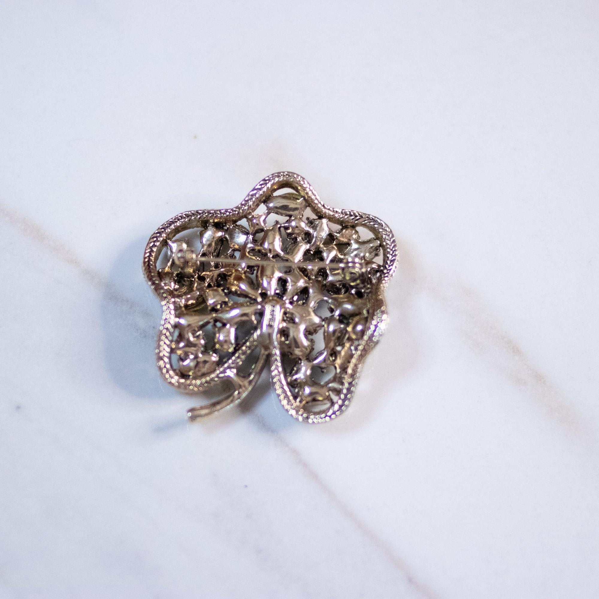 Vintage Monet Green Rhinestone Clover Brooch by Monet - Vintage Meet Modern Vintage Jewelry - Chicago, Illinois - #oldhollywoodglamour #vintagemeetmodern #designervintage #jewelrybox #antiquejewelry #vintagejewelry