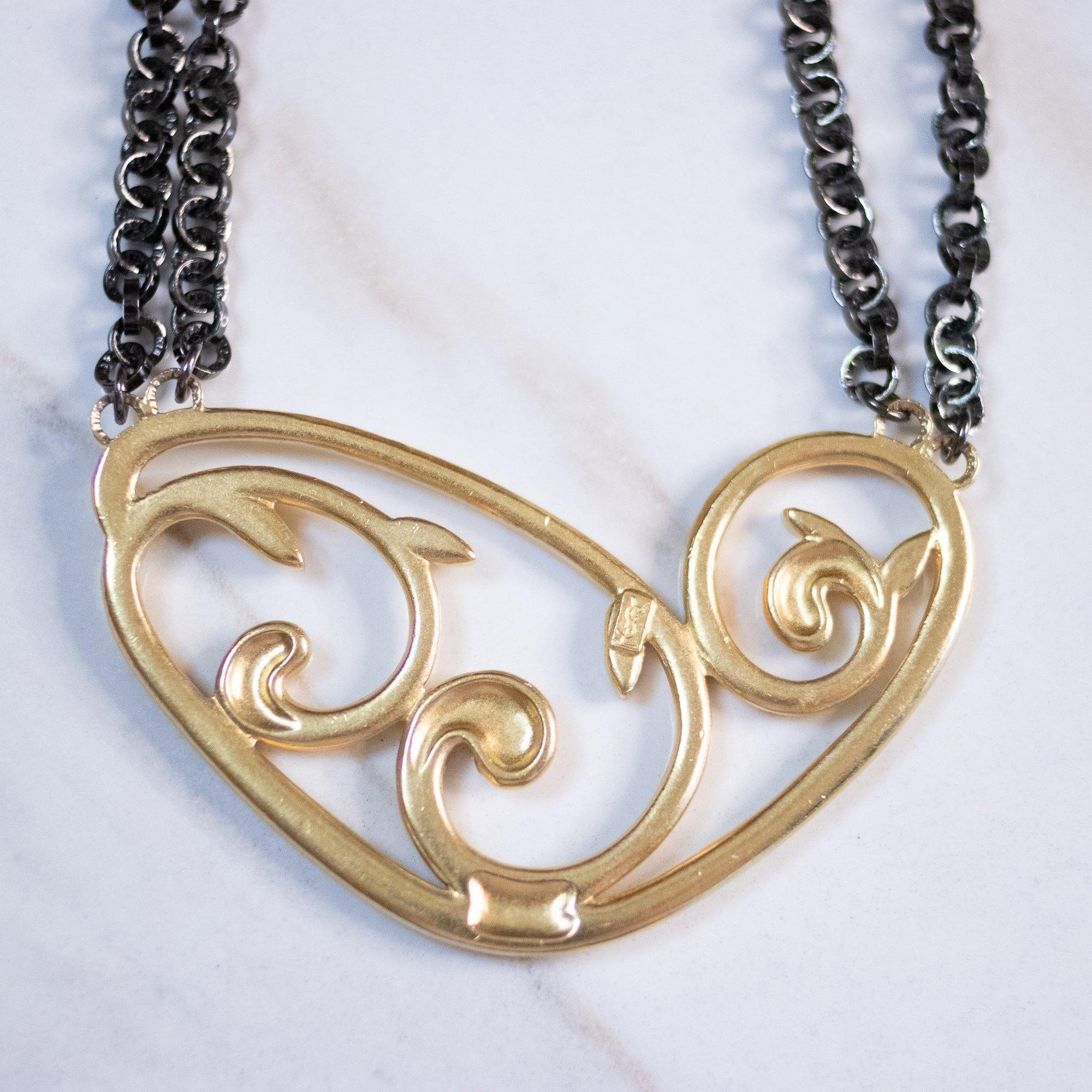 Rare Yves Saint Laurent Gold and Gunmetal Modernist Statement Necklace, Signed Number by Yves Saint Laurent - Vintage Meet Modern Vintage Jewelry - Chicago, Illinois - #oldhollywoodglamour #vintagemeetmodern #designervintage #jewelrybox #antiquejewelry #vintagejewelry