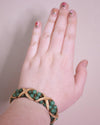 Vintage Mid Century Modern Gold X Bracelet with Green Beads by Unsigned Beauty - Vintage Meet Modern Vintage Jewelry - Chicago, Illinois - #oldhollywoodglamour #vintagemeetmodern #designervintage #jewelrybox #antiquejewelry #vintagejewelry